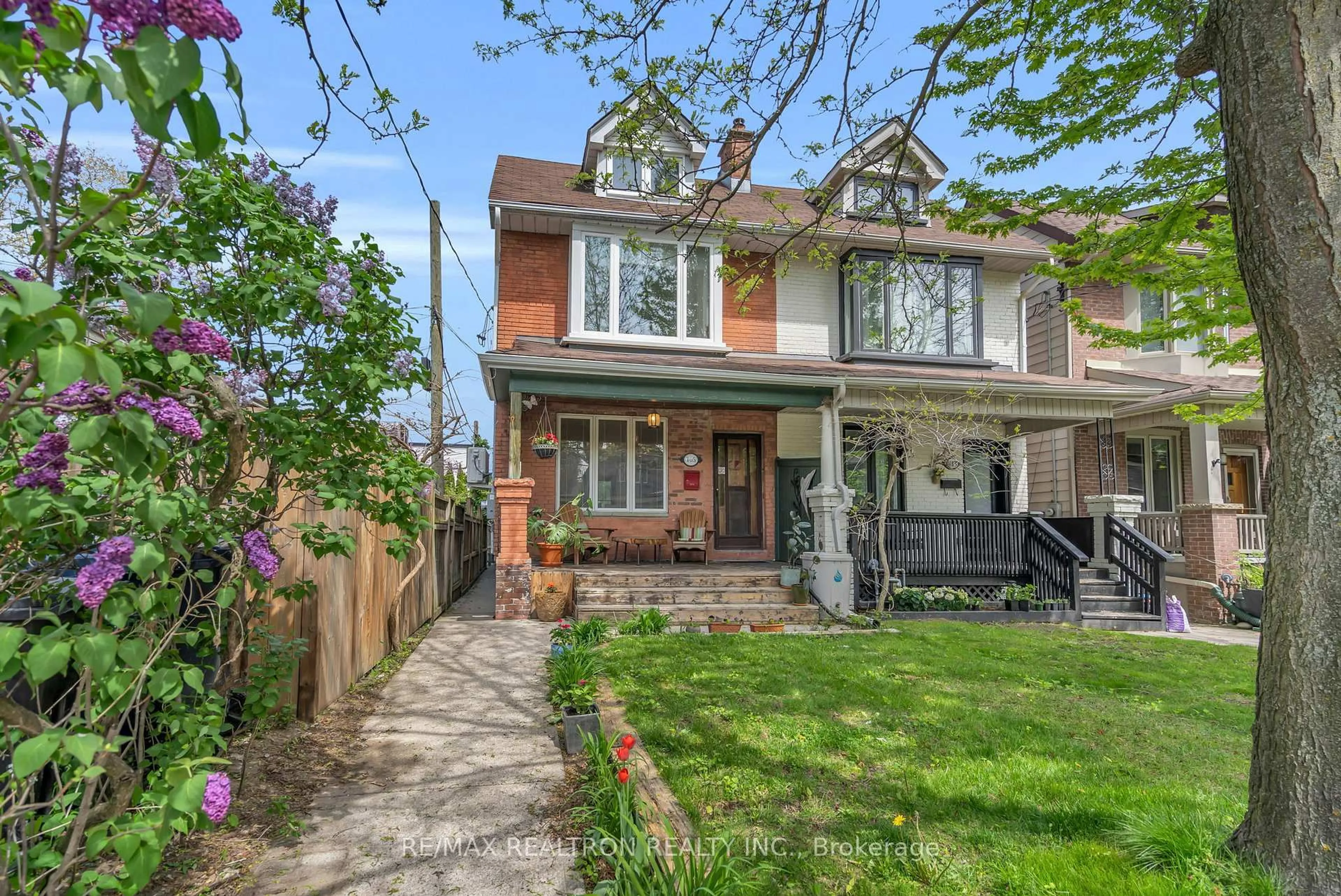 Home with brick exterior material, street for 105 Dewhurst Blvd, Toronto Ontario M4J 3J5