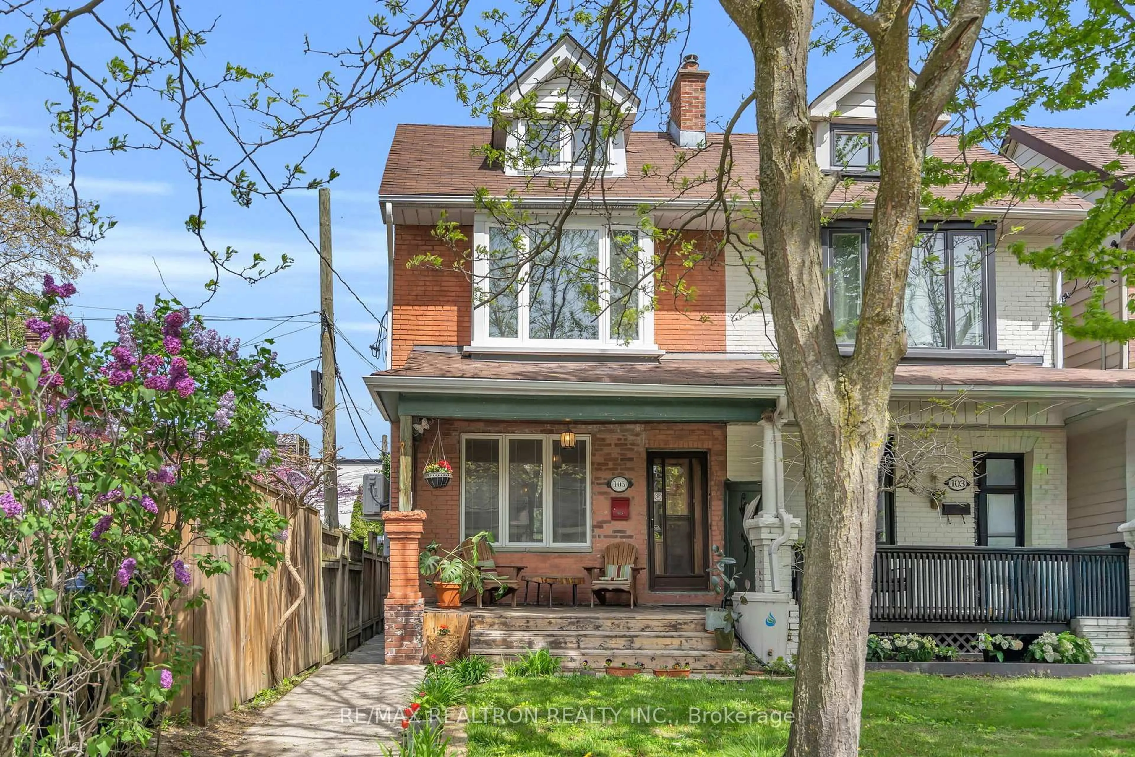 Home with brick exterior material, street for 105 Dewhurst Blvd, Toronto Ontario M4J 3J5