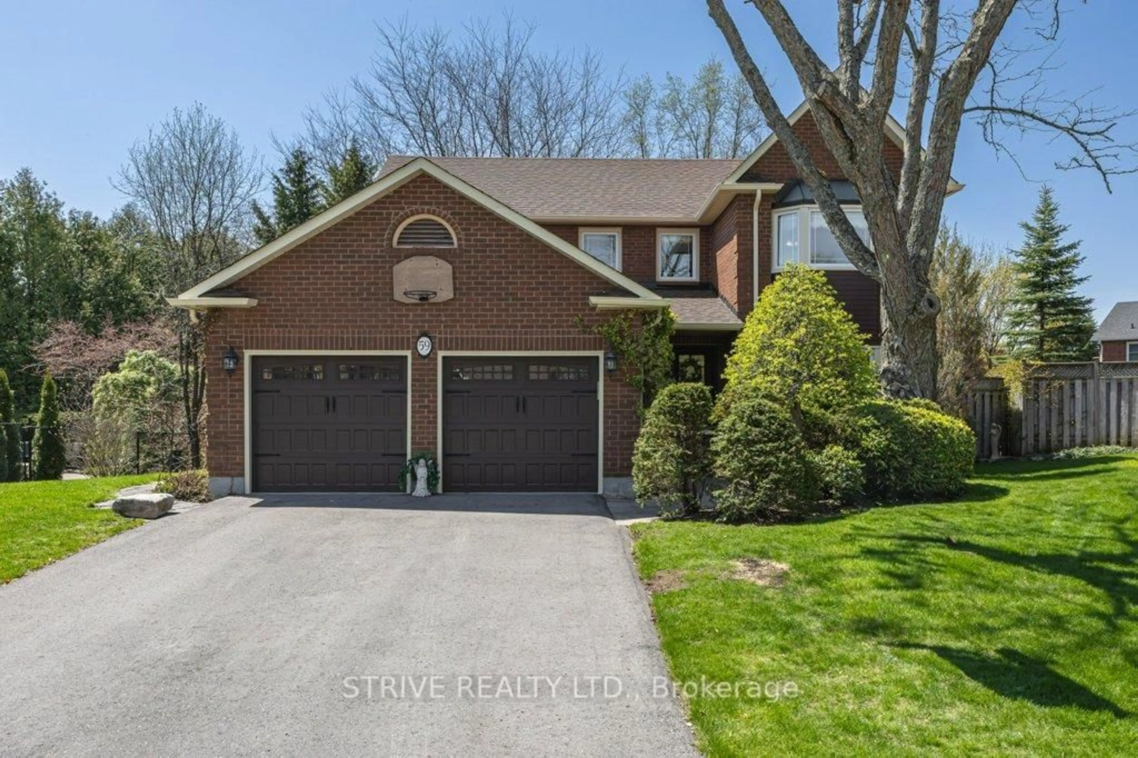 Home with brick exterior material, street for 59 Blackcreek Tr, Clarington Ontario L1E 1J9