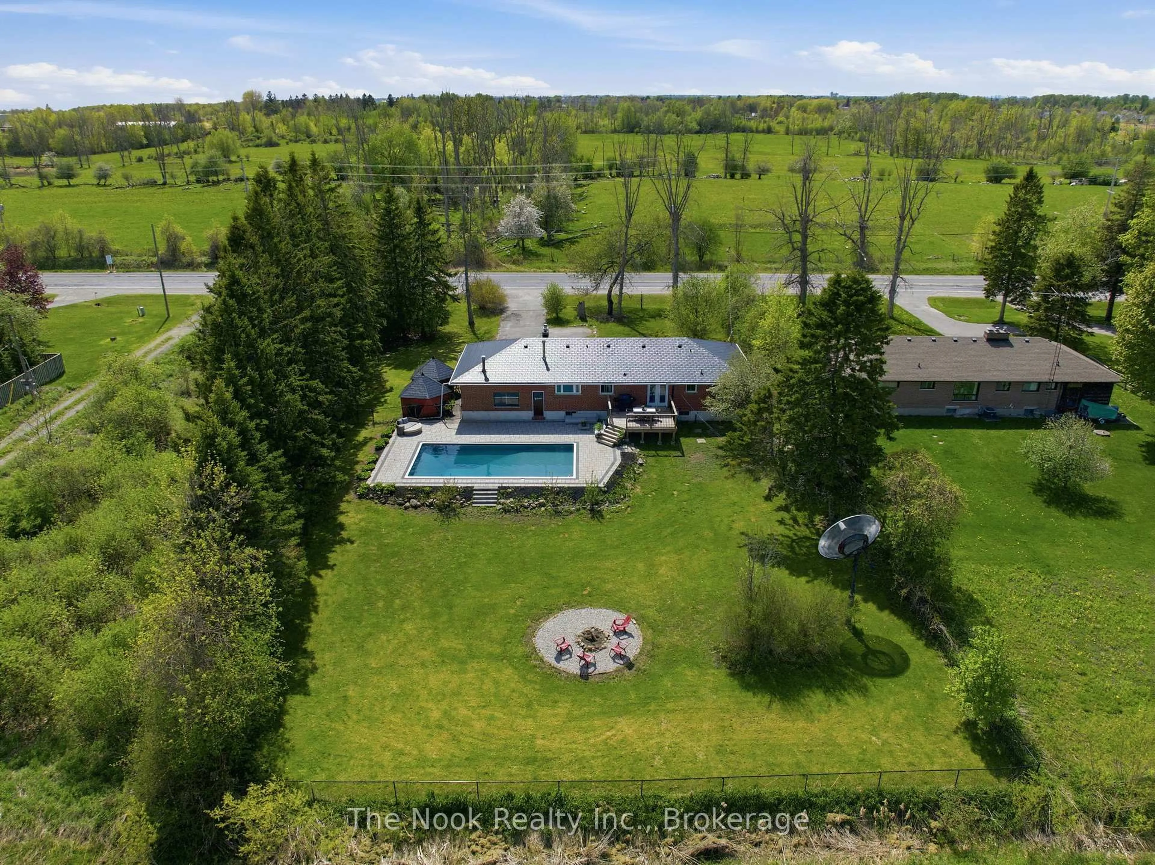 A pic from outside/outdoor area/front of a property/back of a property/a pic from drone, water/lake/river/ocean view for 2165 Courtice Rd, Clarington Ontario L1E 2M8