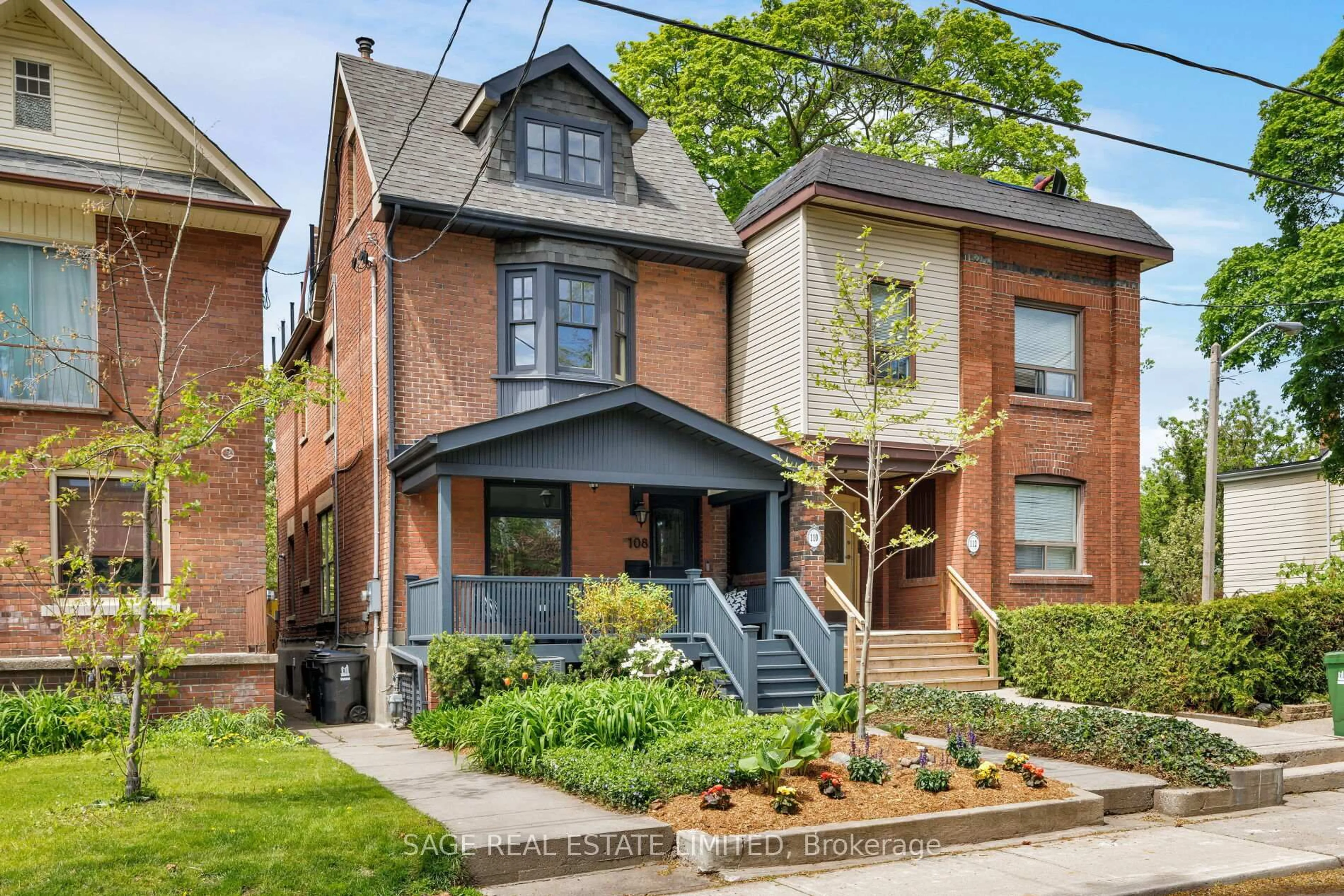 Home with brick exterior material, street for 108 Dewhurst Blvd, Toronto Ontario M4J 3J3