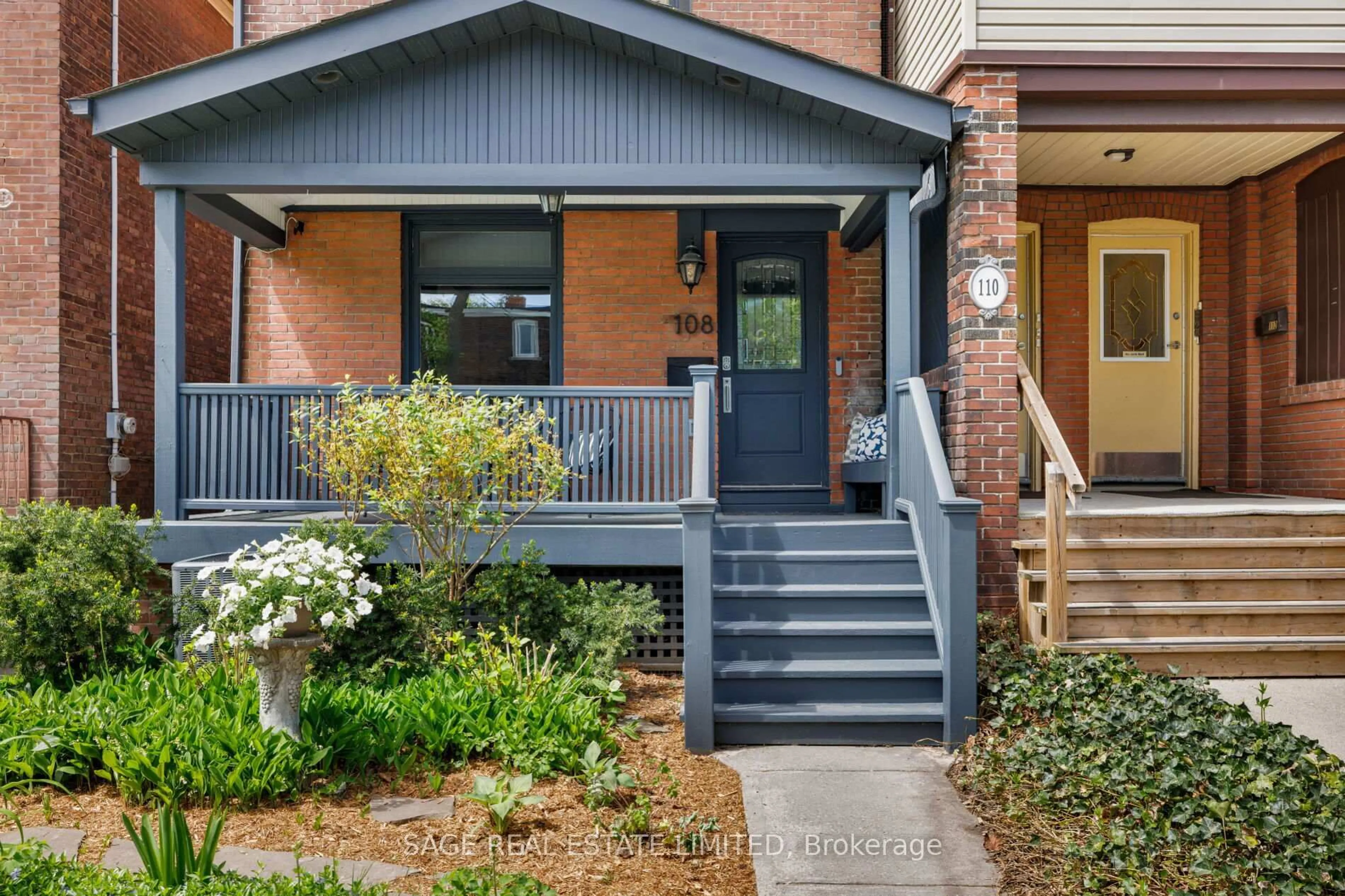 Home with brick exterior material, street for 108 Dewhurst Blvd, Toronto Ontario M4J 3J3