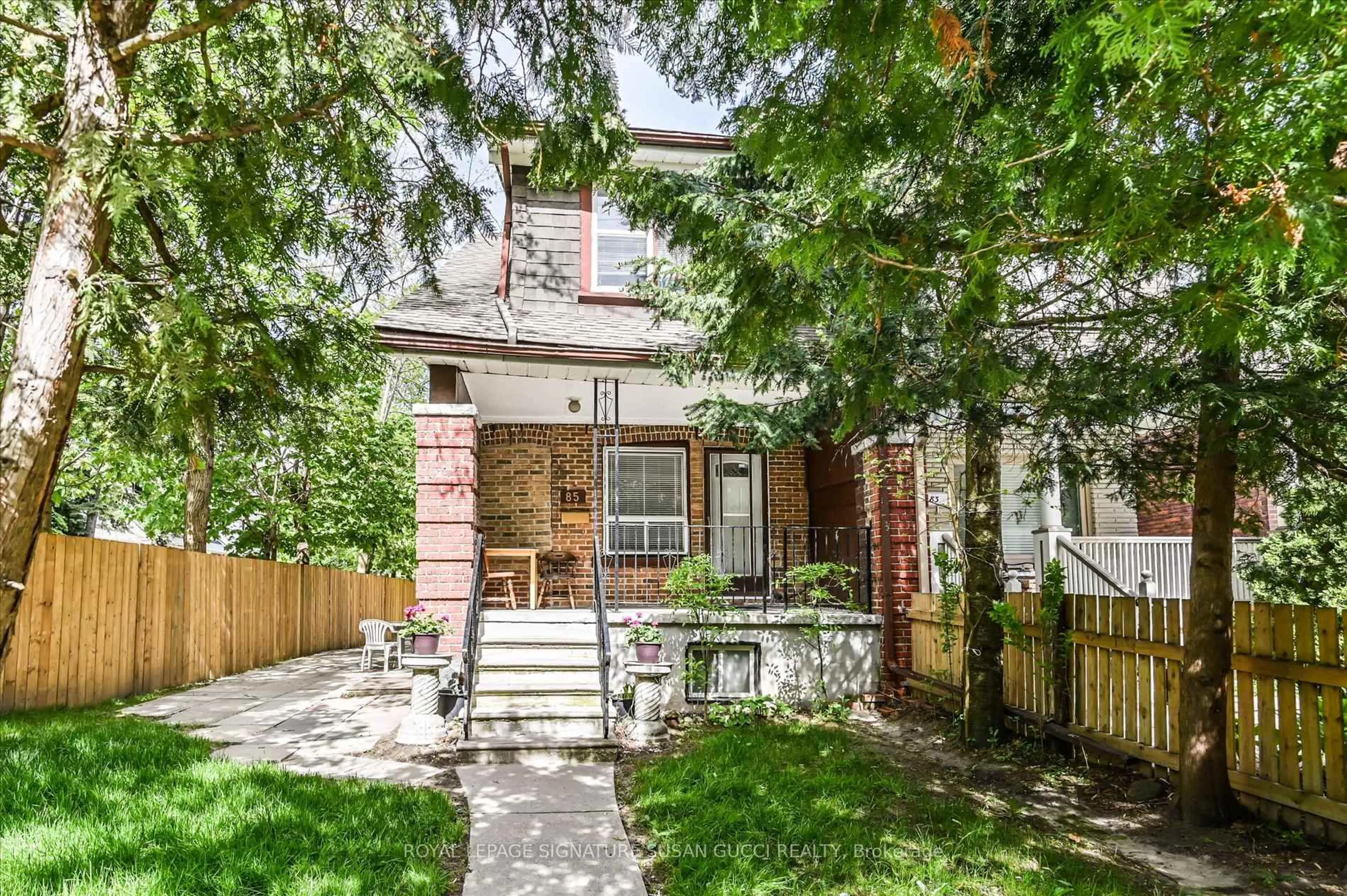 Home with brick exterior material, street for 85 Linsmore Cres, Toronto Ontario M4J 4K2