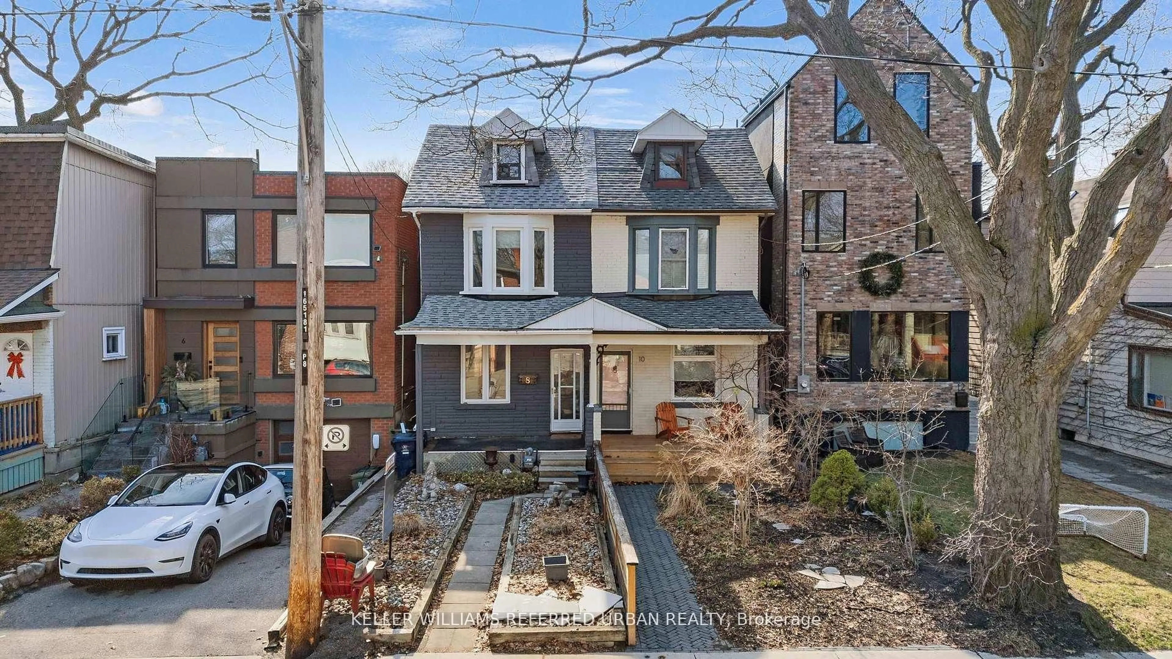 Home with brick exterior material, street for 8 Woodlee Rd, Toronto Ontario M4E 2R1