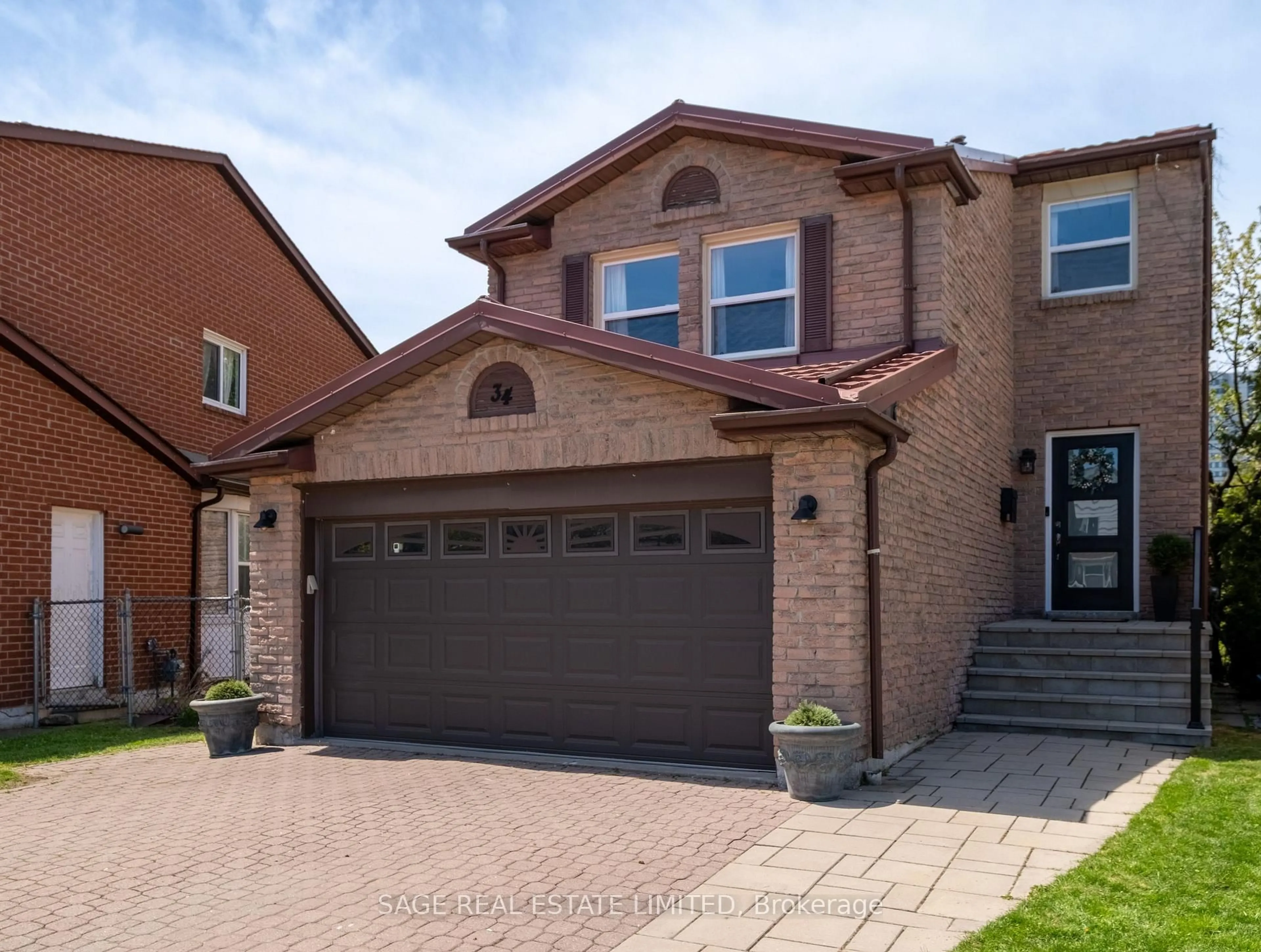 Home with brick exterior material, street for 34 Tambrook Dr, Toronto Ontario M1W 3L9