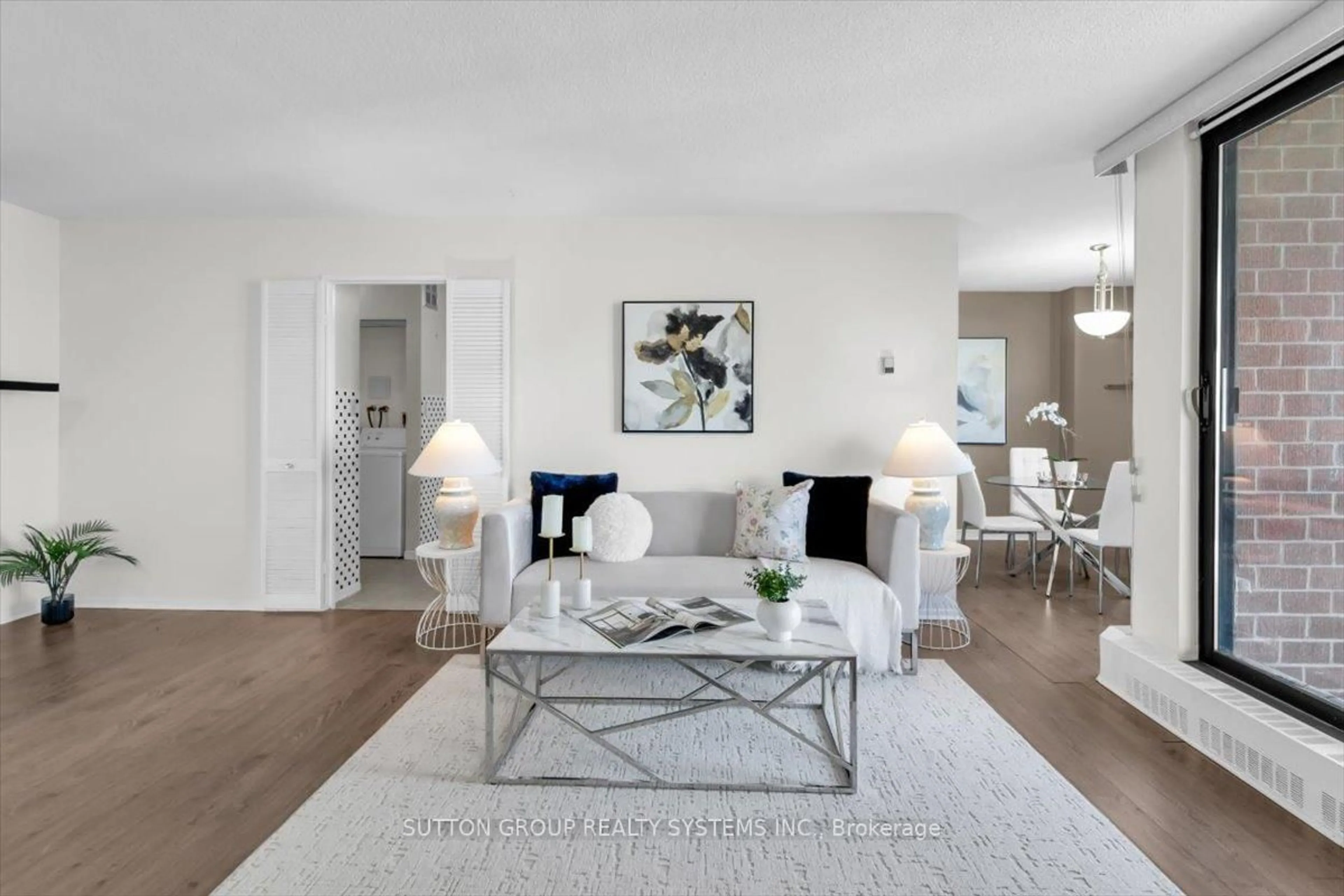 Living room with furniture, unknown for 90 Ling Rd #PH109, Toronto Ontario M1E 4Y3