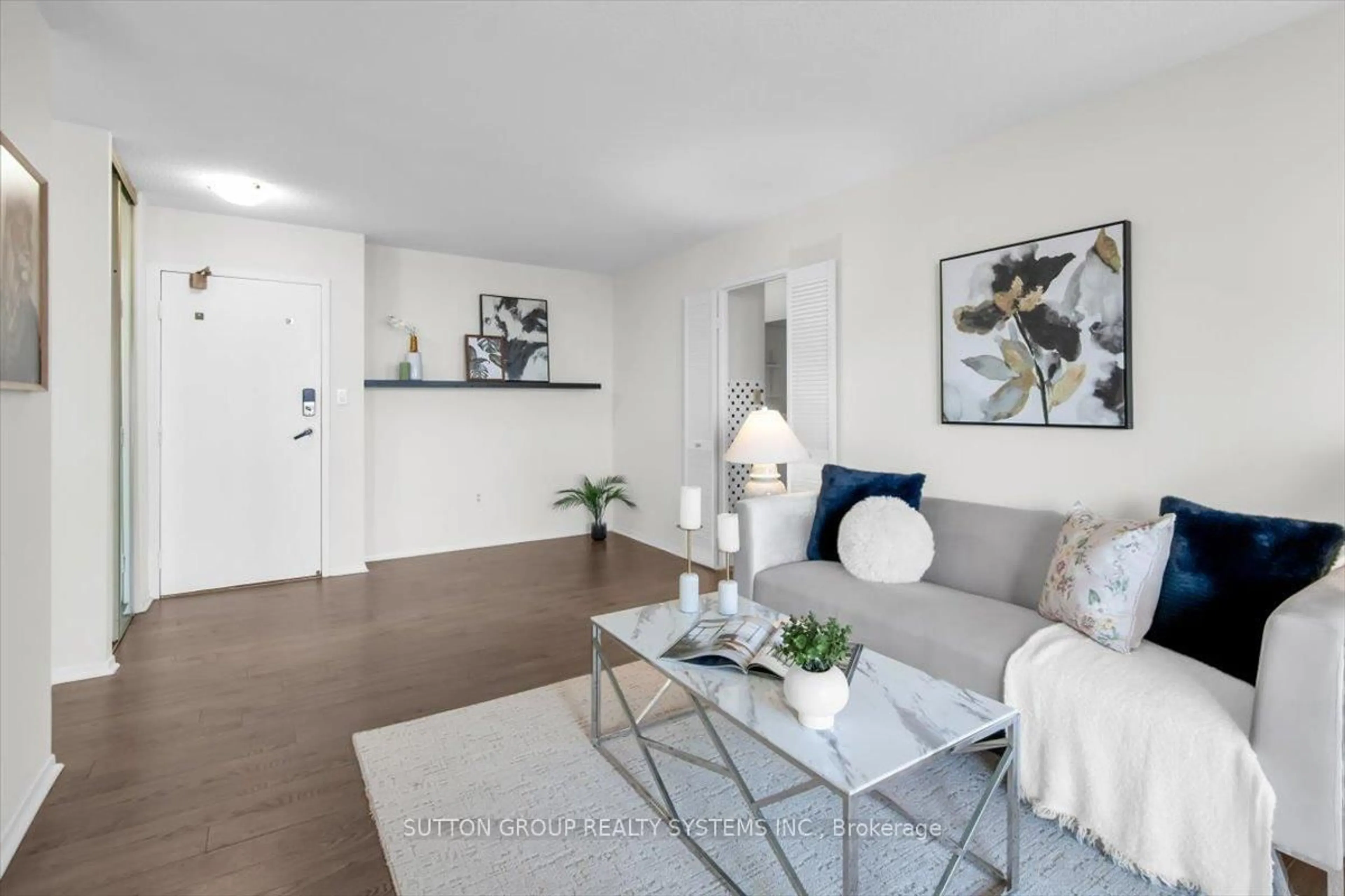 Living room with furniture, unknown for 90 Ling Rd #PH109, Toronto Ontario M1E 4Y3