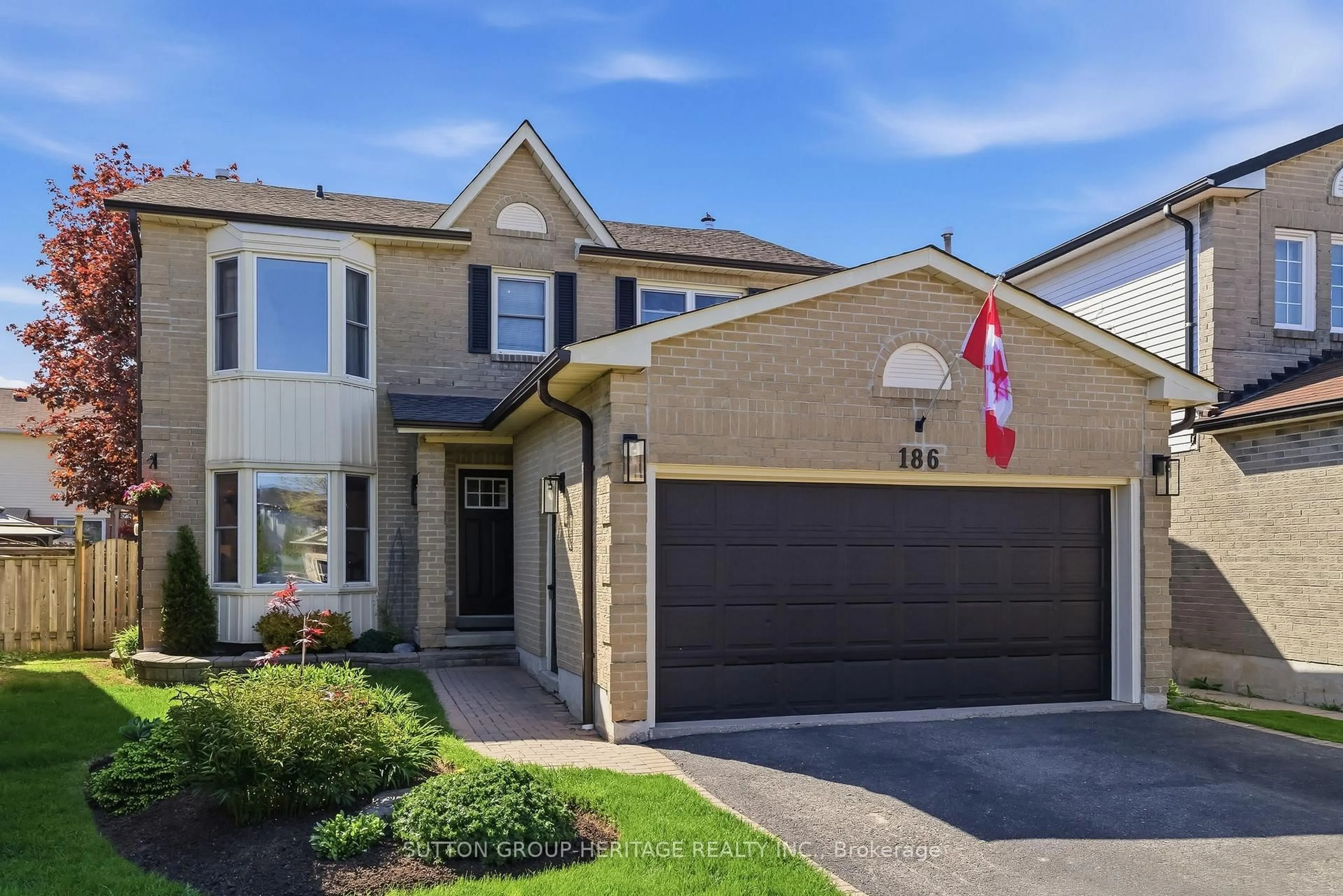 Home with brick exterior material, street for 186 Reed Dr, Ajax Ontario L1S 6P6