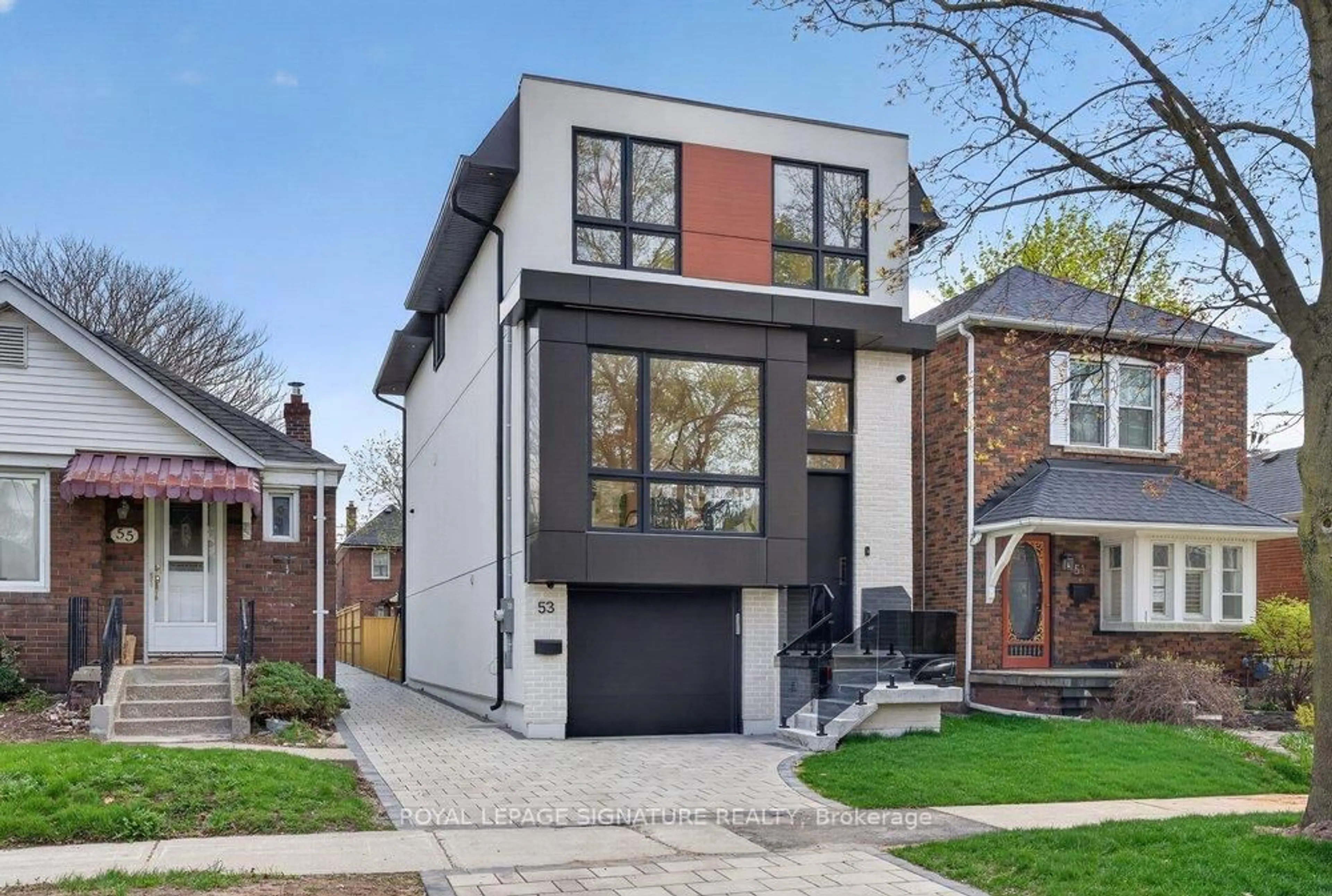 Home with brick exterior material, street for 53 Lesmount Ave, Toronto Ontario M4J 3V7