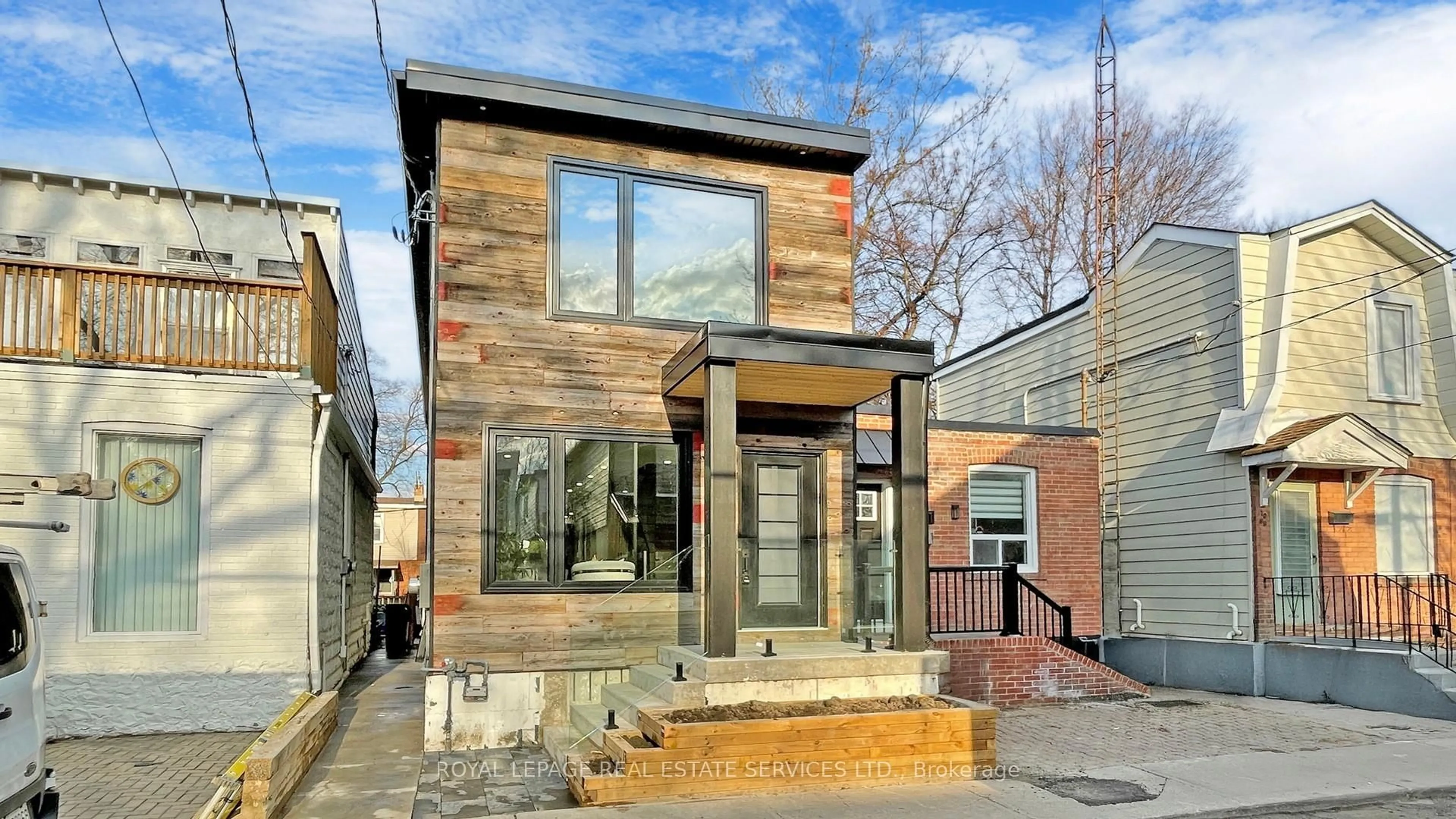 Home with brick exterior material, street for 1073 Craven Rd, Toronto Ontario M4J 4V7