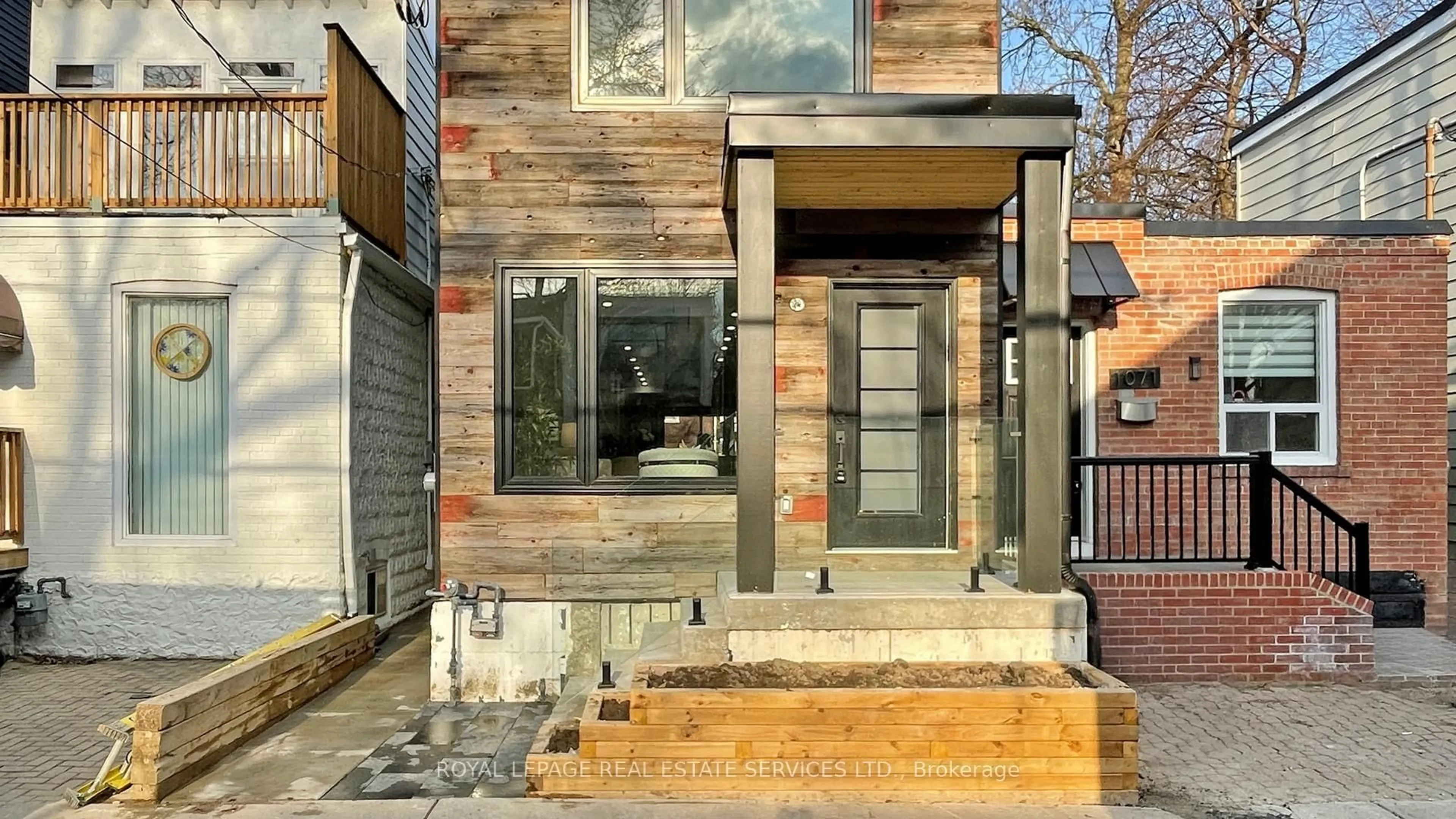 Home with brick exterior material, street for 1073 Craven Rd, Toronto Ontario M4J 4V7