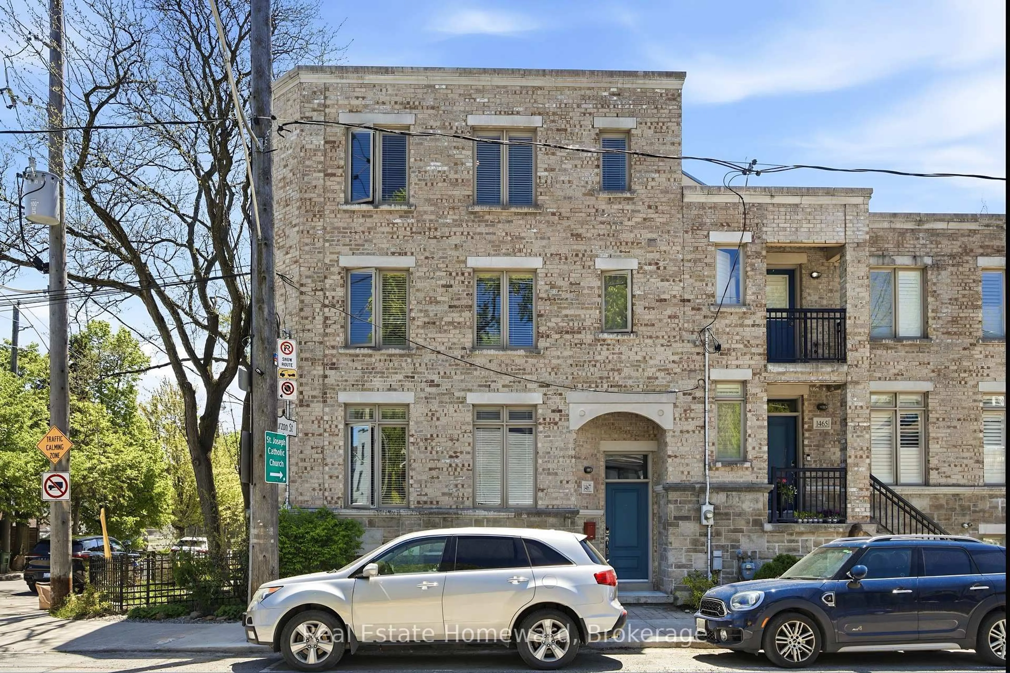 Home with brick exterior material, street for 1467 Dundas St, Toronto Ontario M4M 1S7