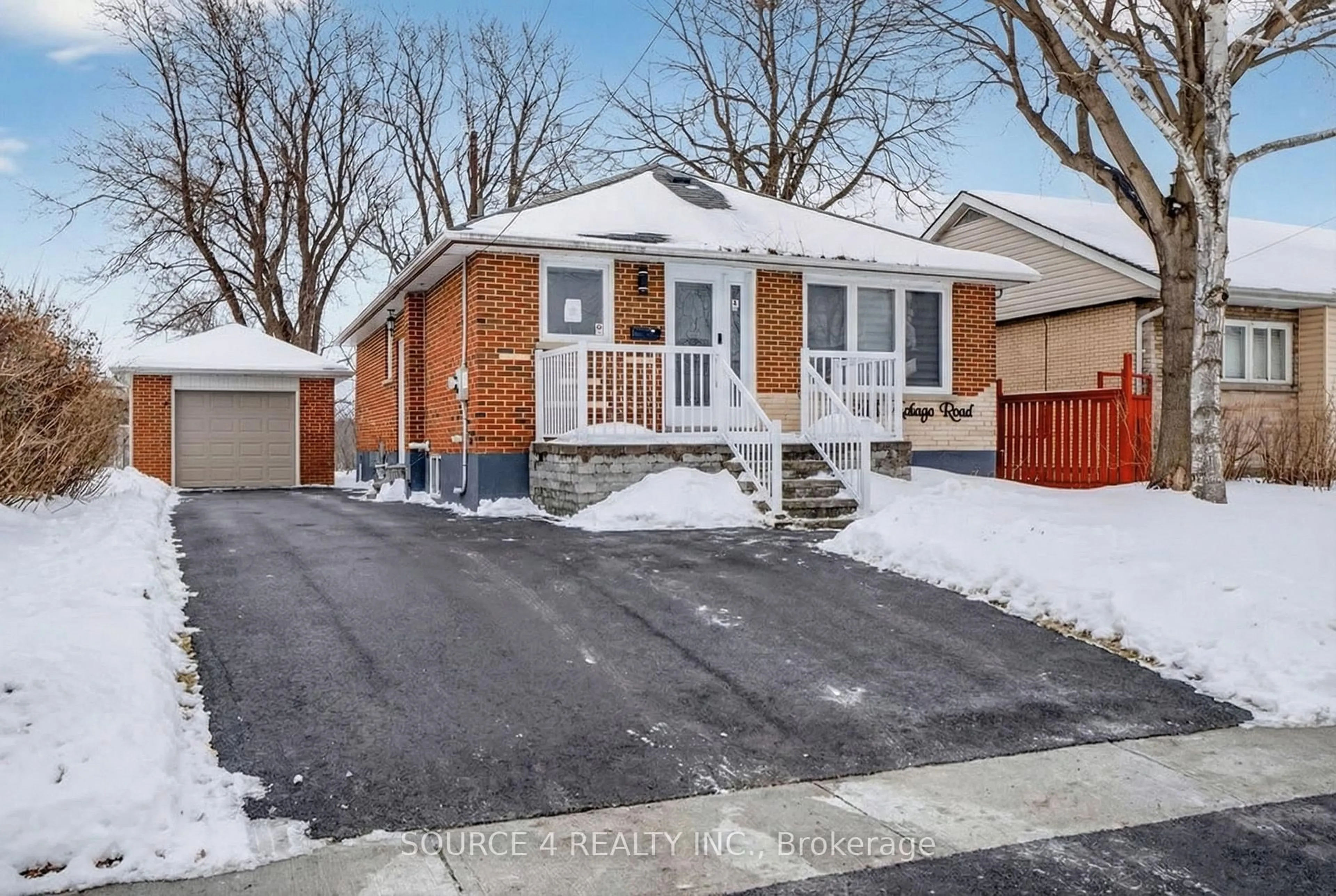 Home with brick exterior material, street for 243 Malaga Rd, Oshawa Ontario L1J 1N6