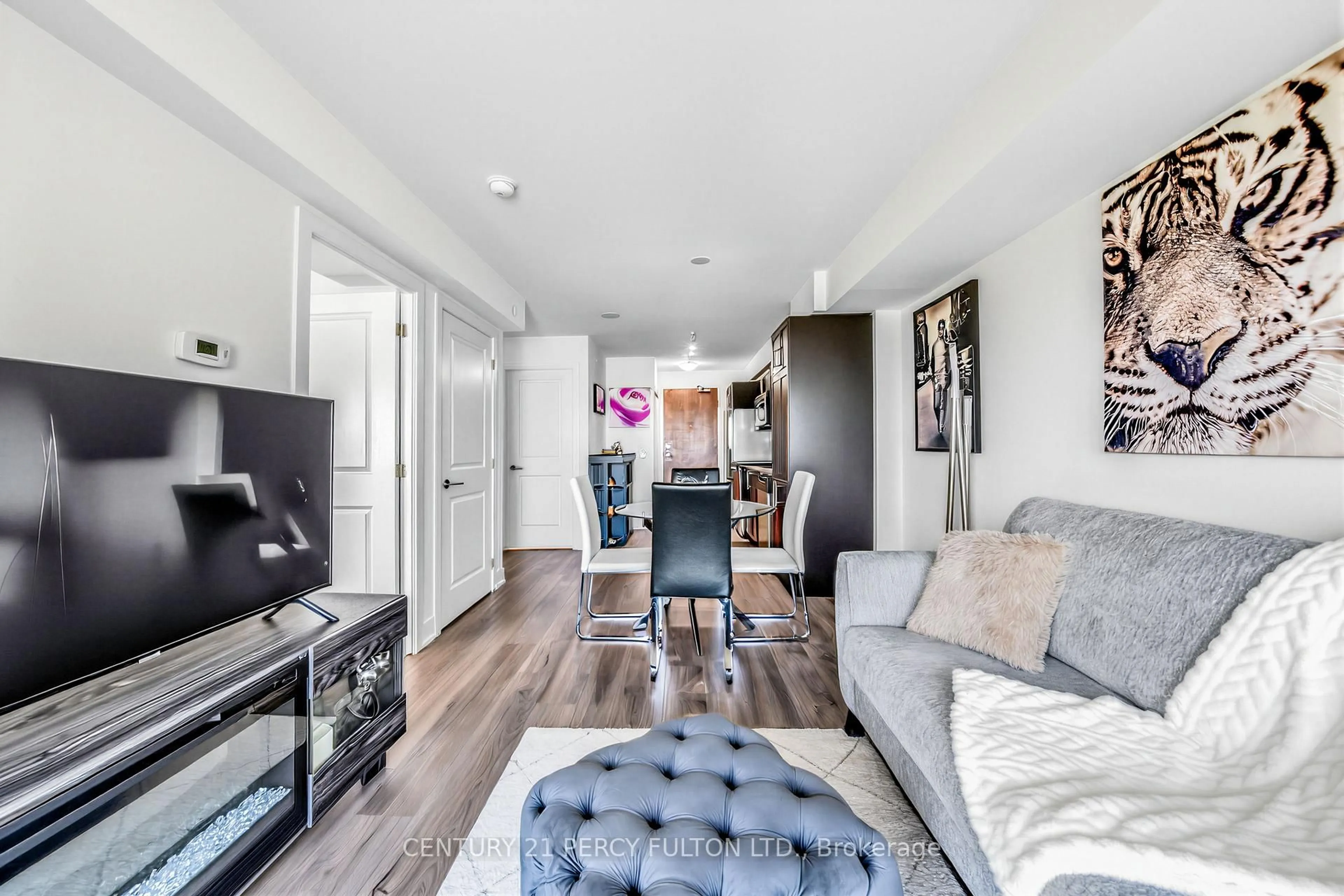 Living room with furniture, wood/laminate floor for 1215 Bayly St #1303, Pickering Ontario L1W 1L7