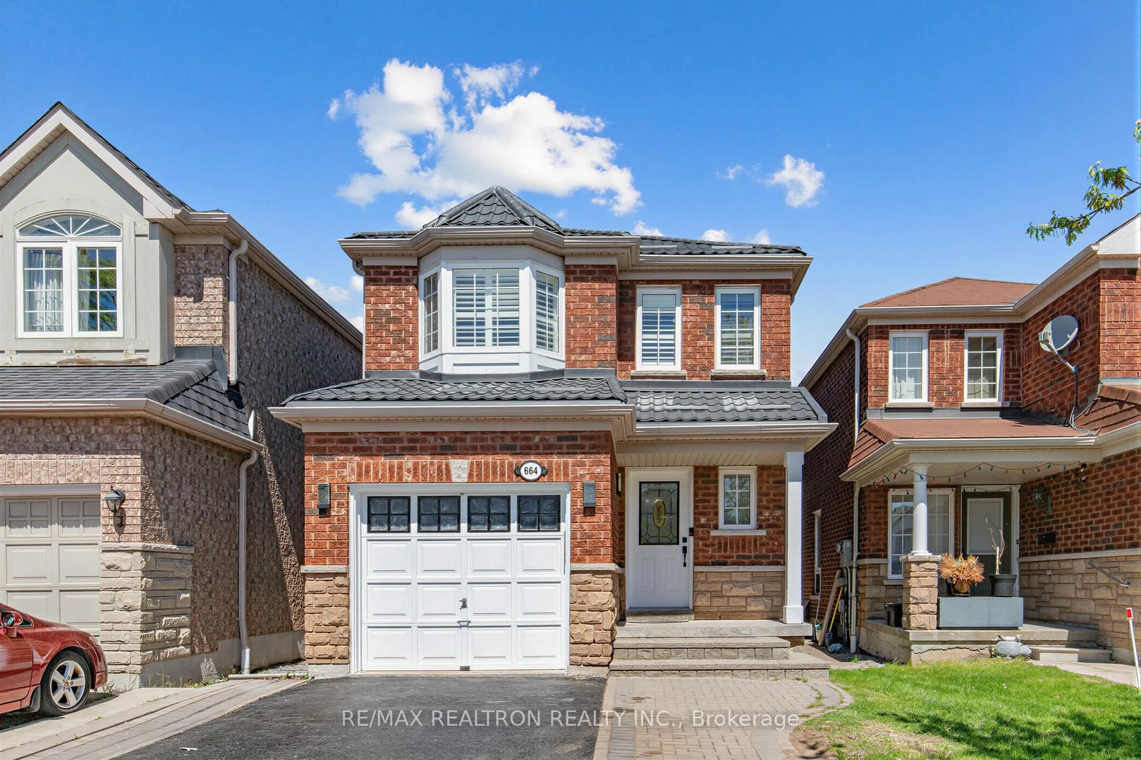 Home with brick exterior material, street for 664 Sunbird Tr, Pickering Ontario L1X 2X6