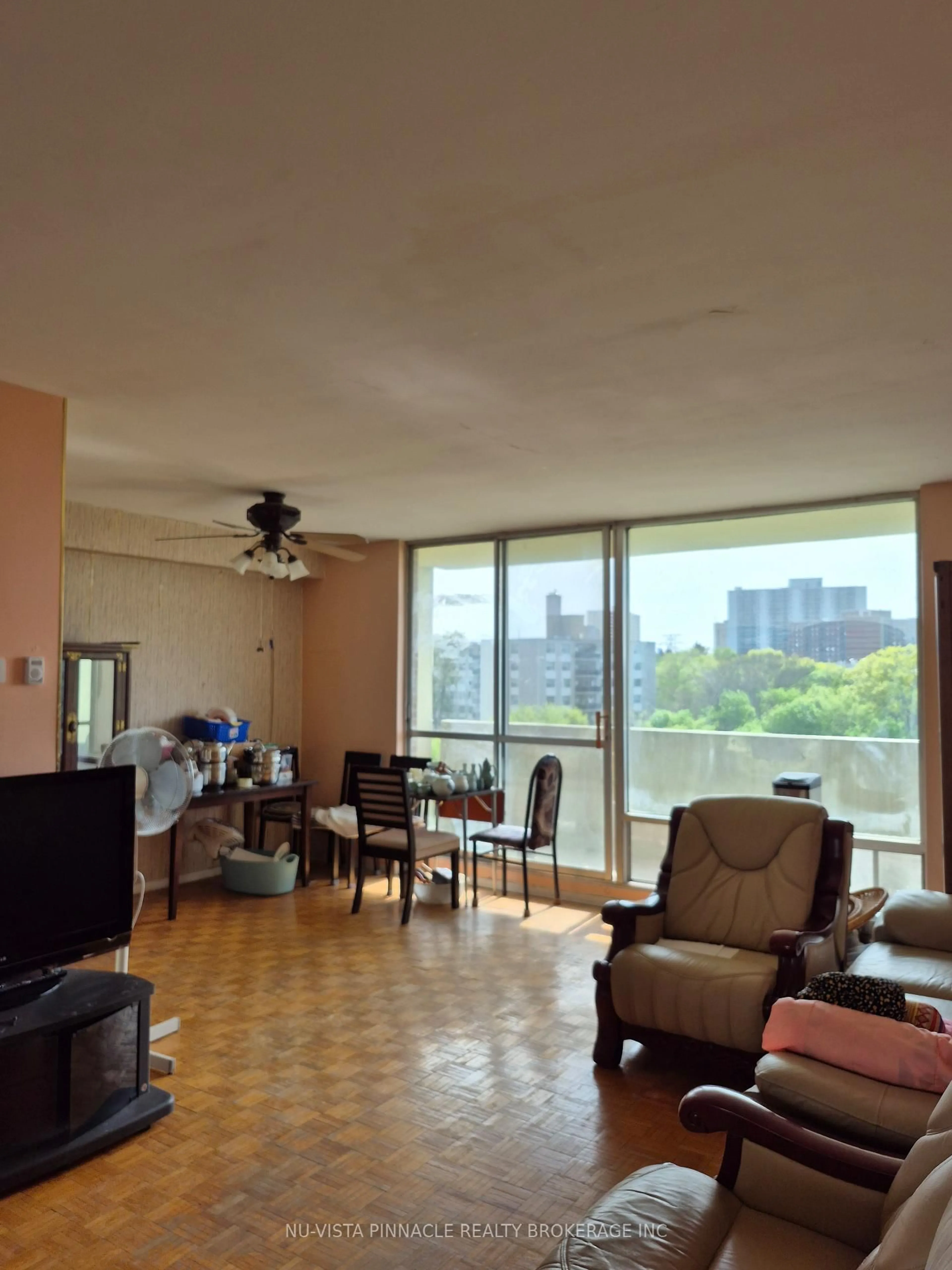 Living room with furniture, unknown for 1 Massey Sq #612, Toronto Ontario M4C 5L4