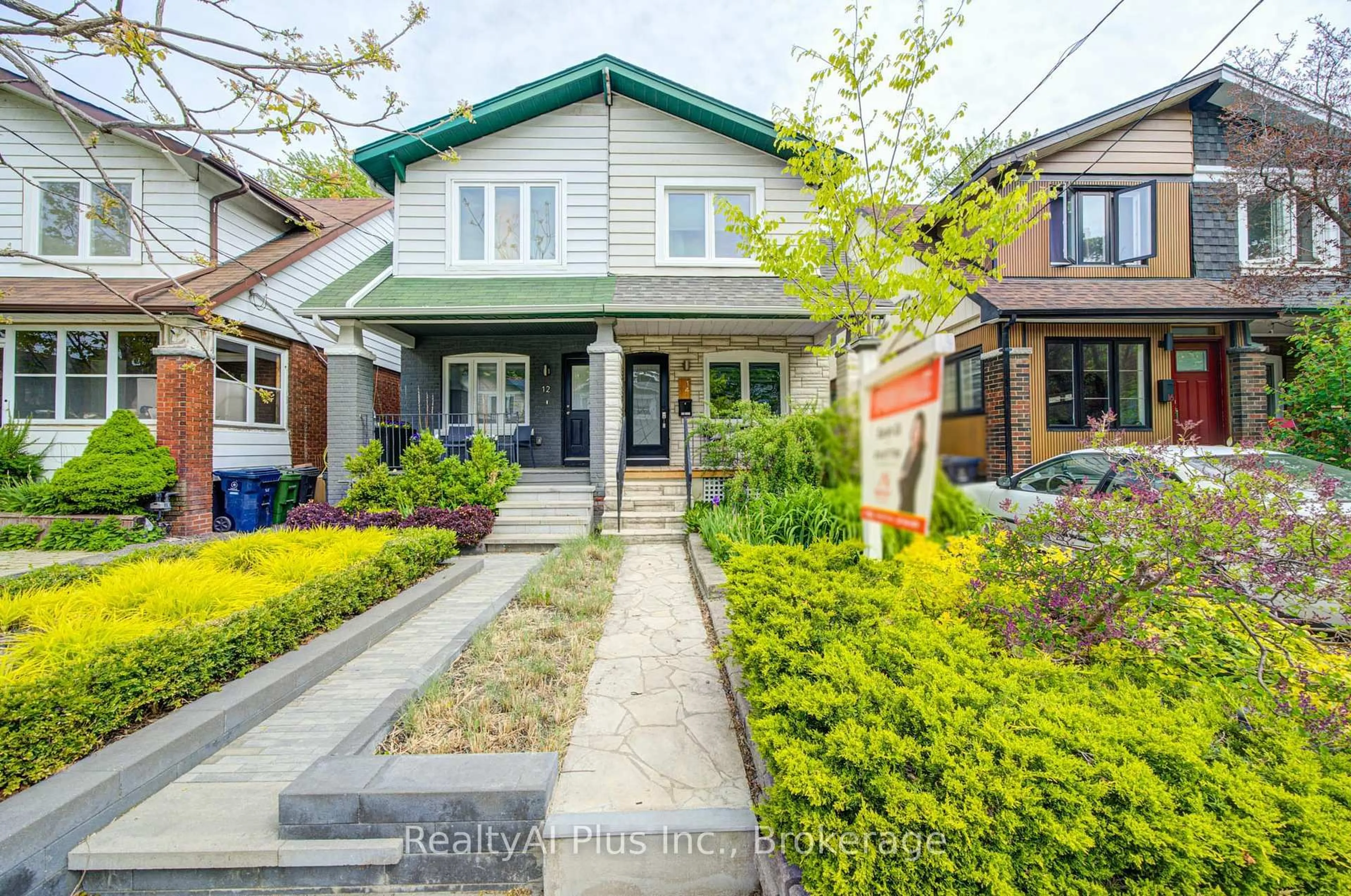 Home with brick exterior material, street for 14 Athletic Ave, Toronto Ontario M4L 1W6