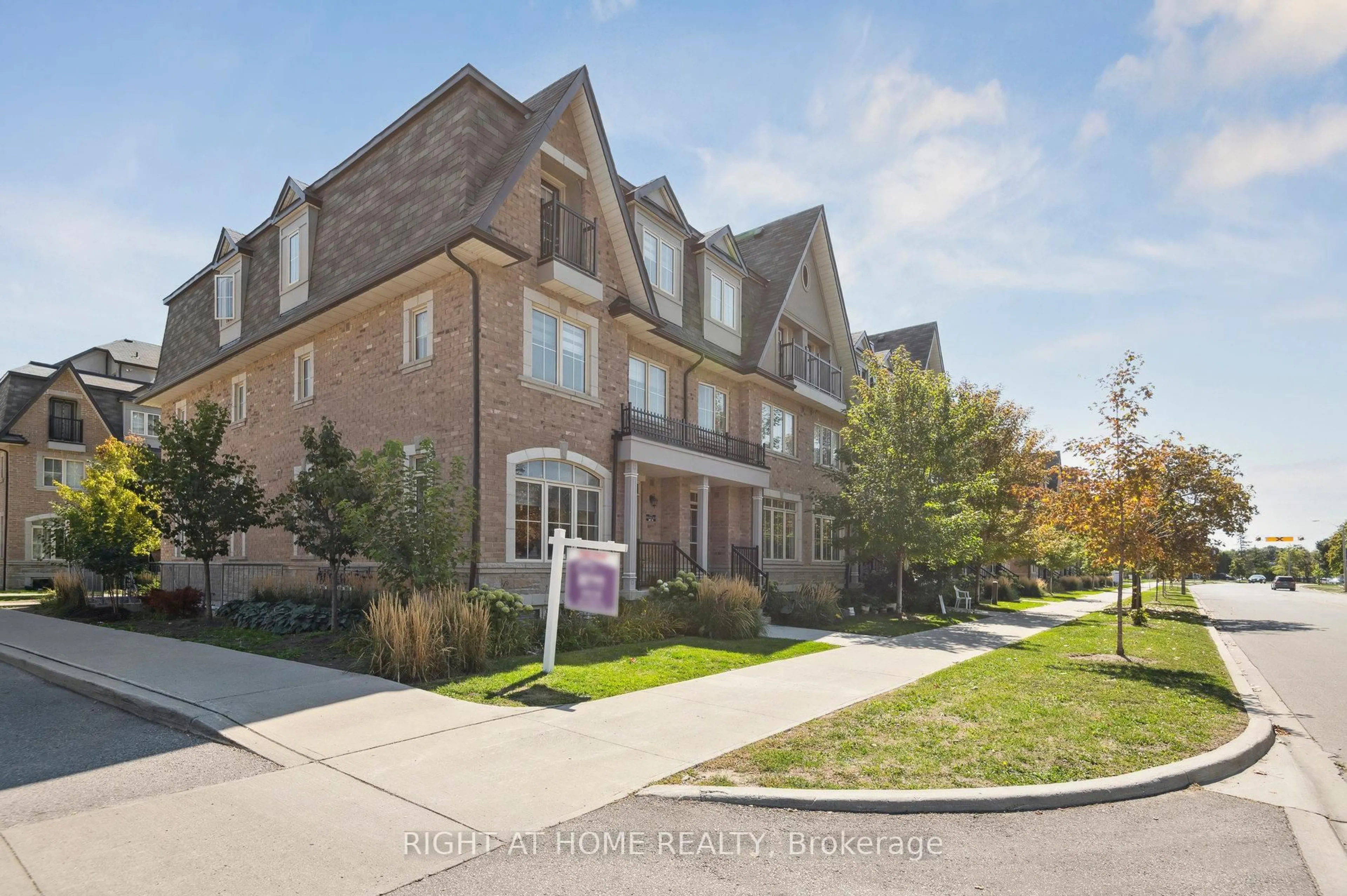 Home with brick exterior material, street for 1255 Bridletowne Circ #14, Toronto Ontario M1W 0A5