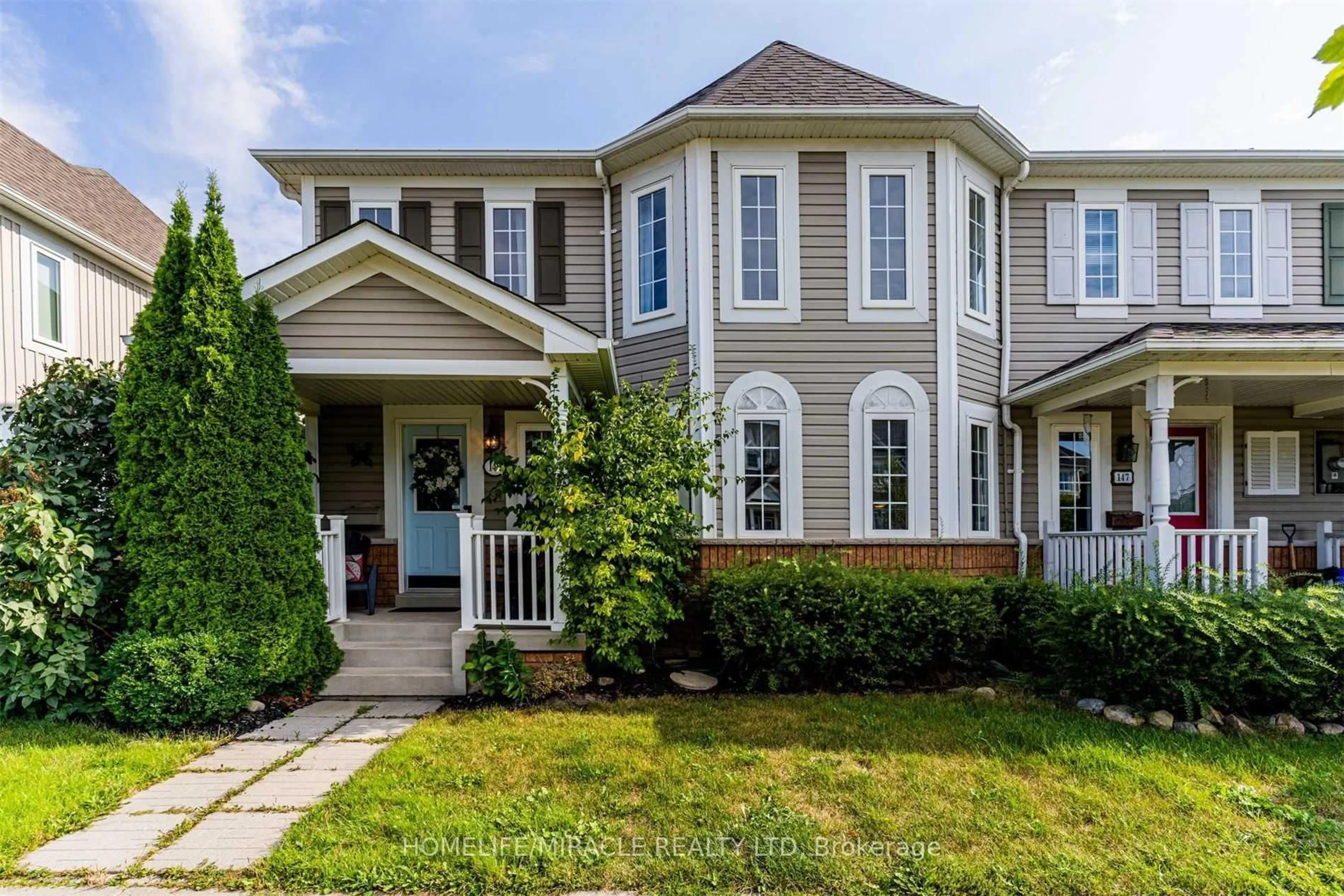 Home with vinyl exterior material, street for 149 Carnwith Dr, Whitby Ontario L1M 2J5
