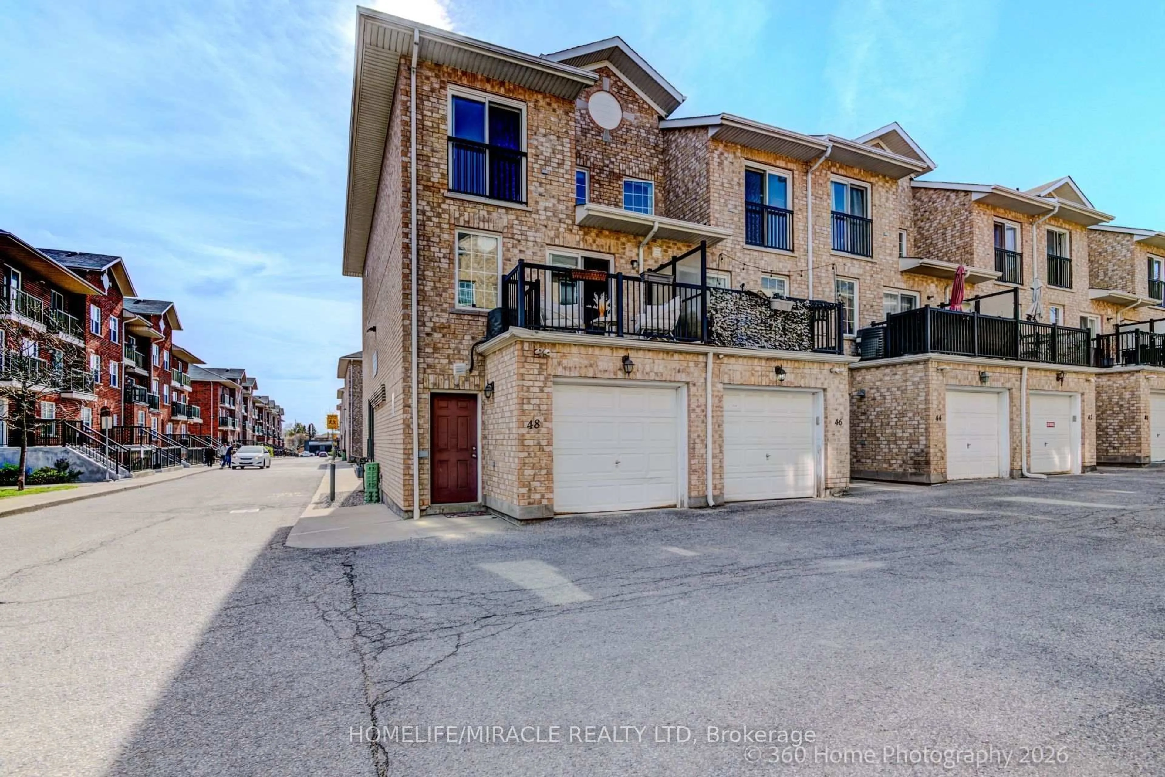 A pic from outside/outdoor area/front of a property/back of a property/a pic from drone, street for 48 Strangford Lane, Toronto Ontario M1L 0E4