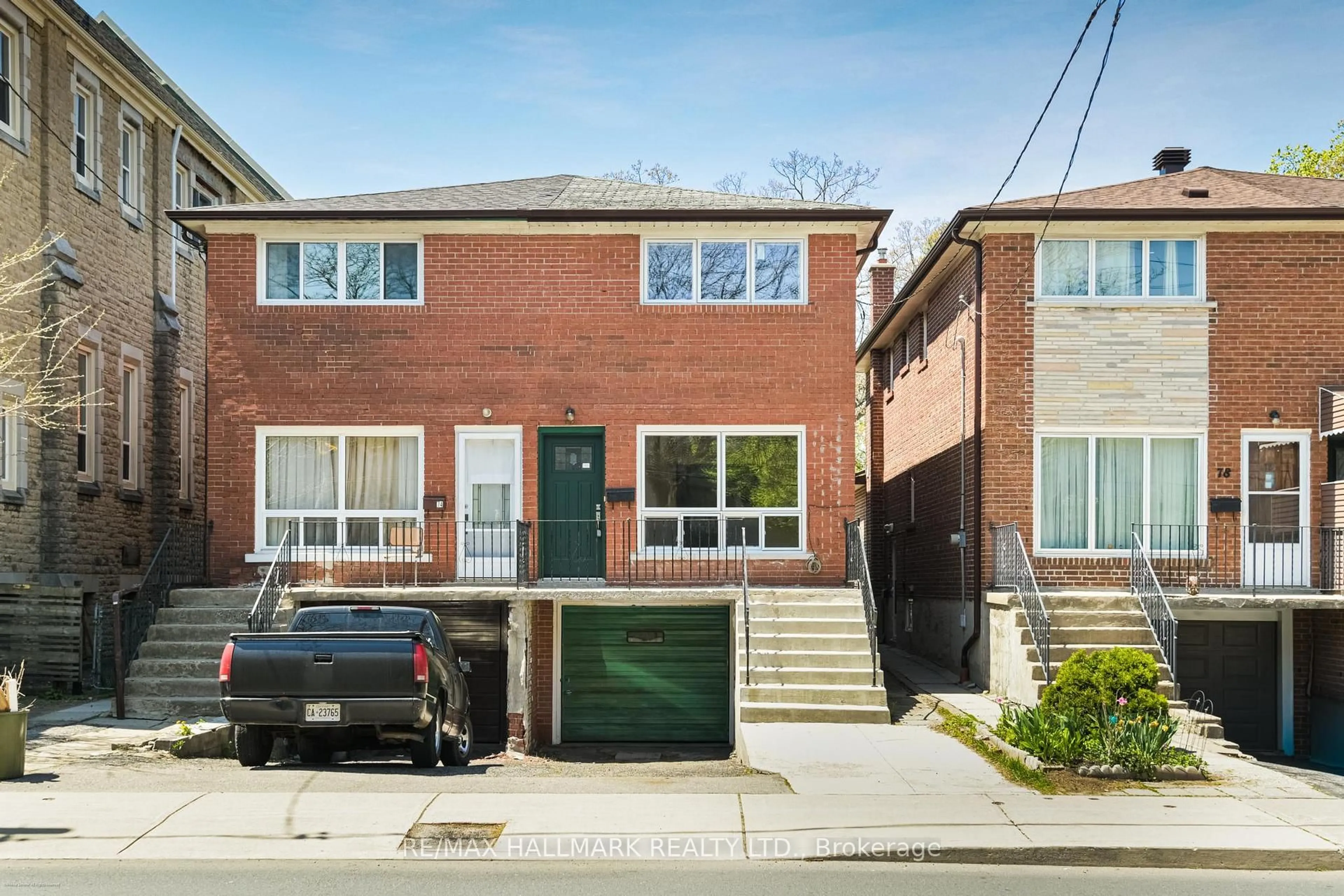 Home with brick exterior material, street for 76 Main St, Toronto Ontario M4E 2V7