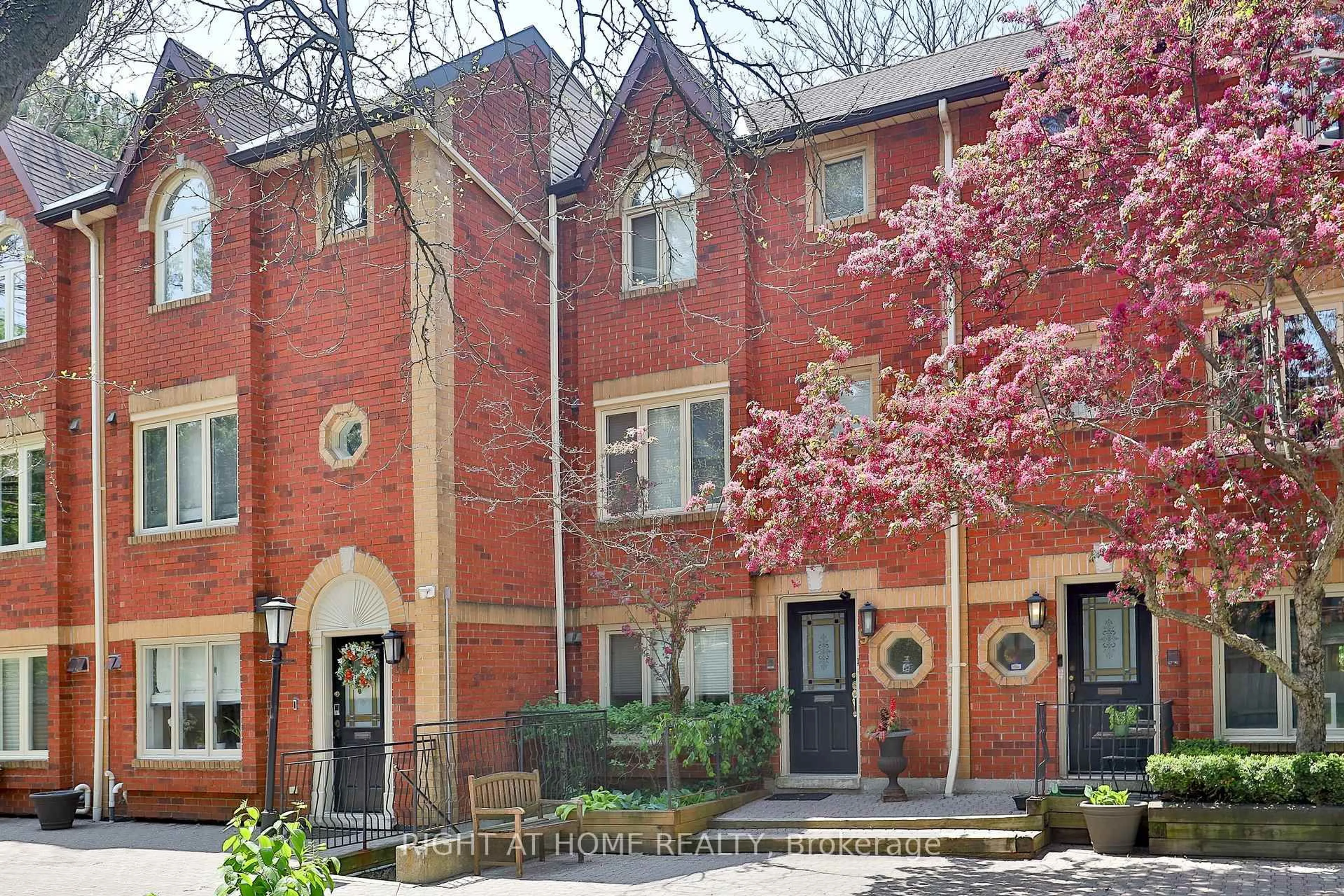 Home with brick exterior material, street for 18 Doncrest Rd #9, Toronto Ontario M4K 1R8