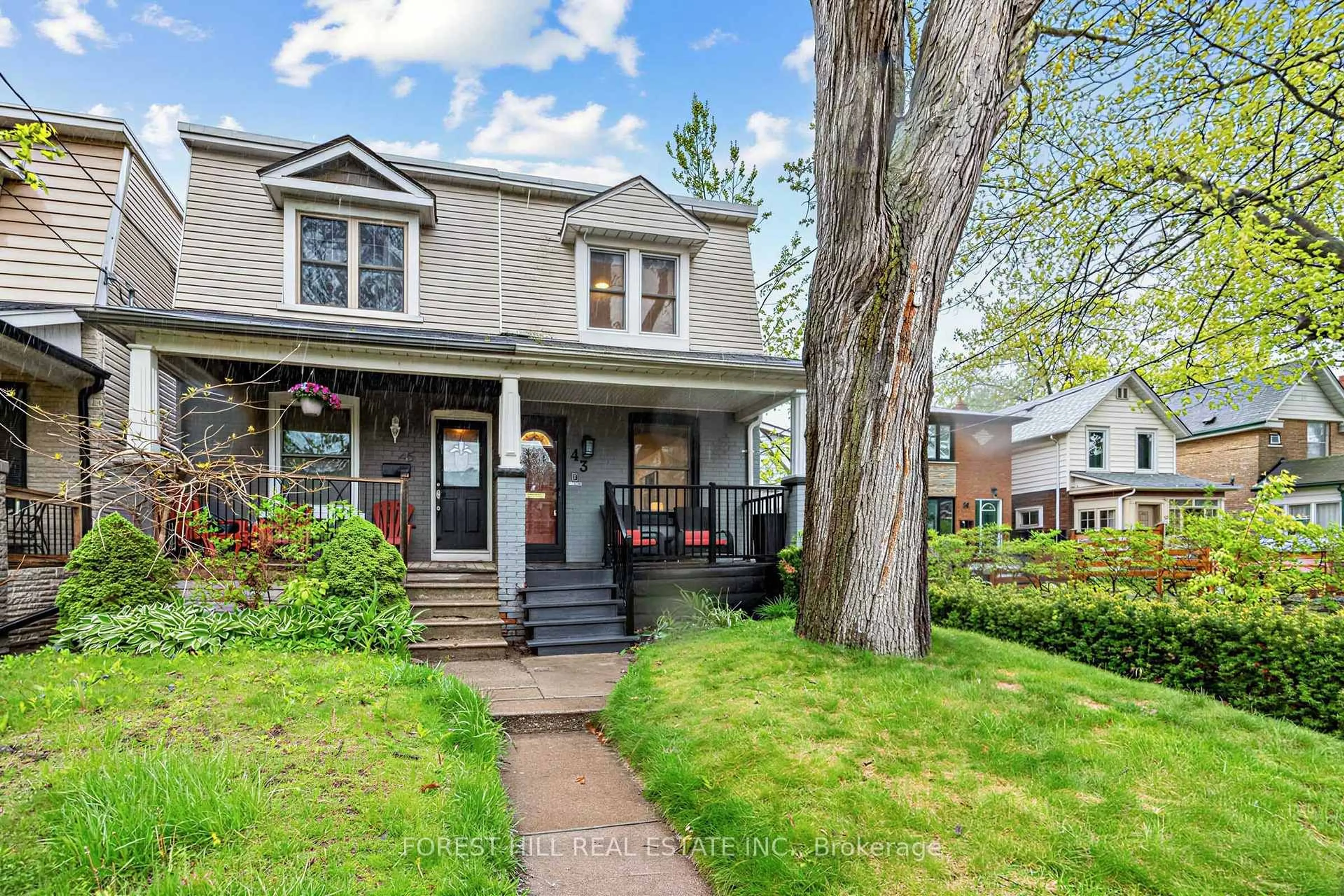 Home with vinyl exterior material, street for 43 Norwood Rd, Toronto Ontario M4E 2S1