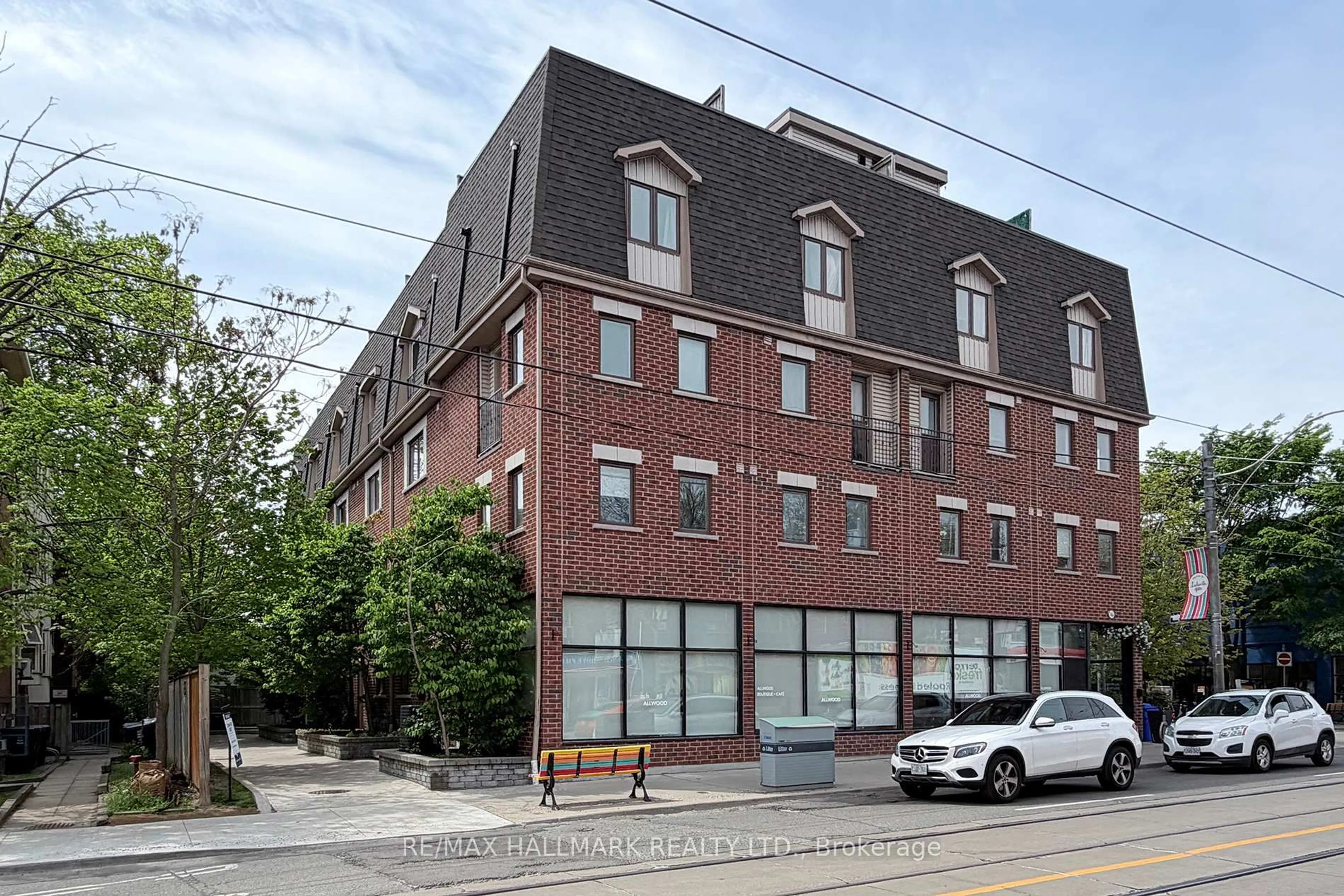 Home with brick exterior material, building for 1185 Queen St #F, Toronto Ontario M4M 1L6