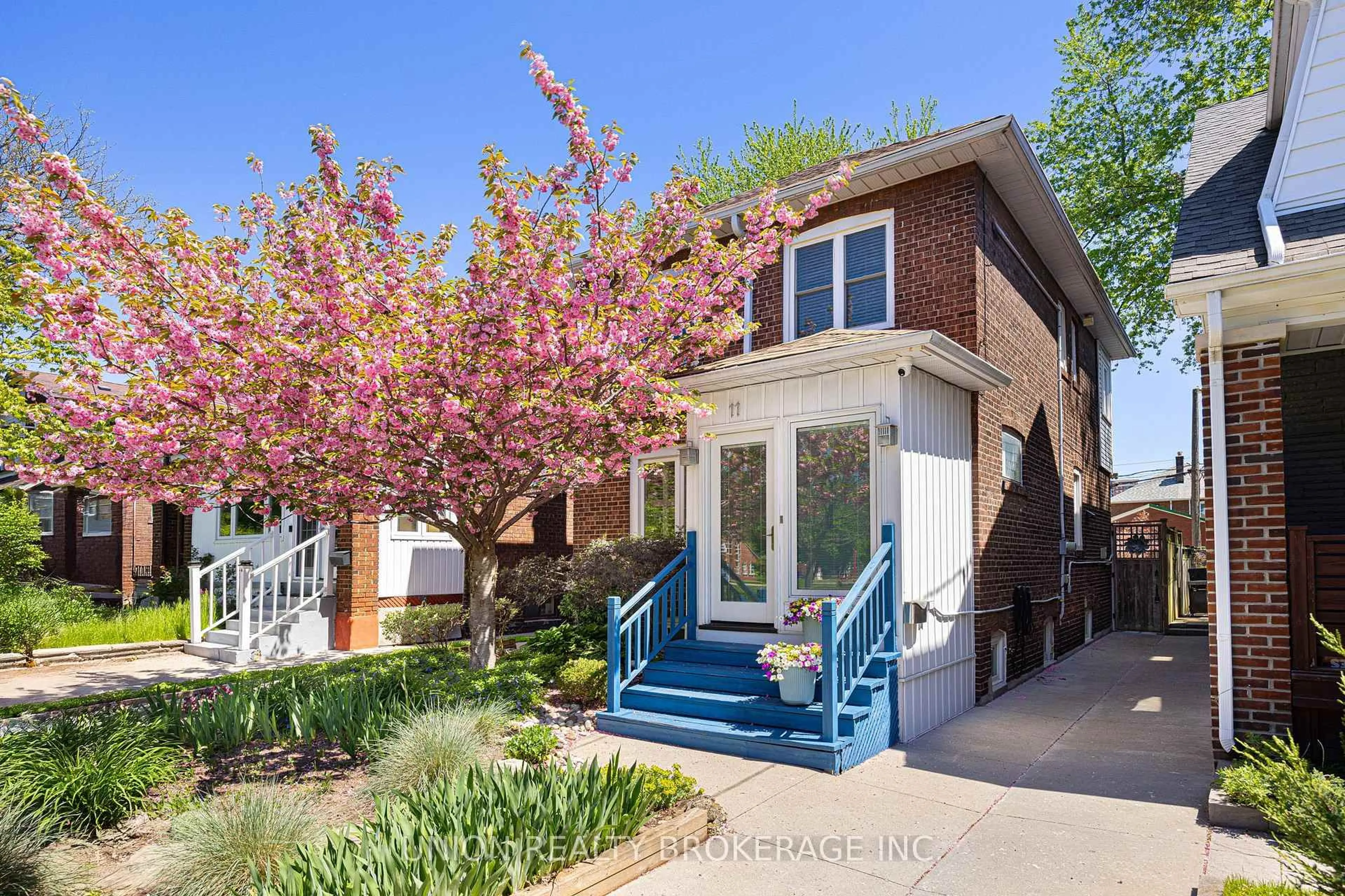 Home with brick exterior material, street for 11 Avonlea Blvd, Toronto Ontario M4C 5E4