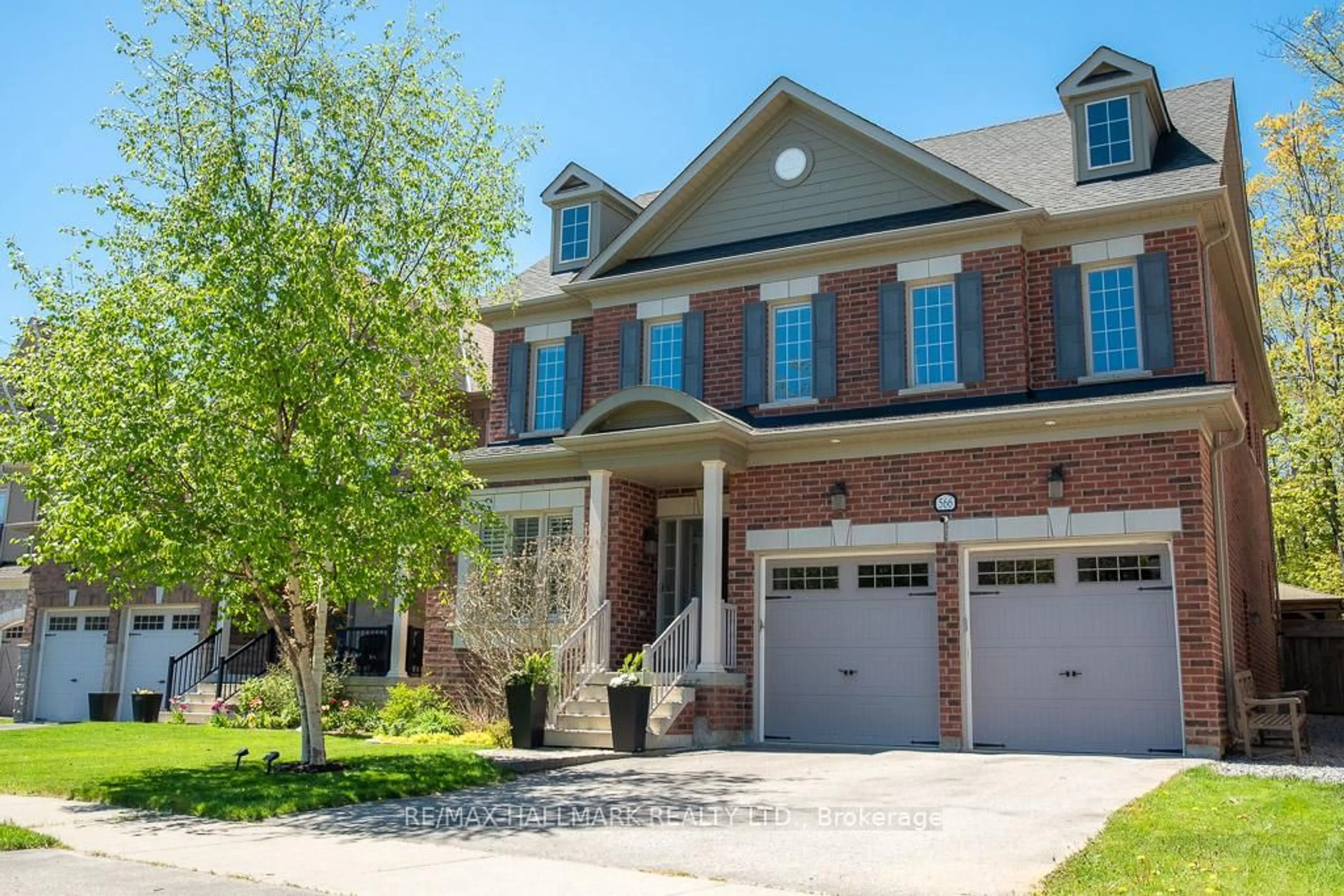 Home with brick exterior material, street for 566 Maitland Dr, Pickering Ontario L1W 0A8