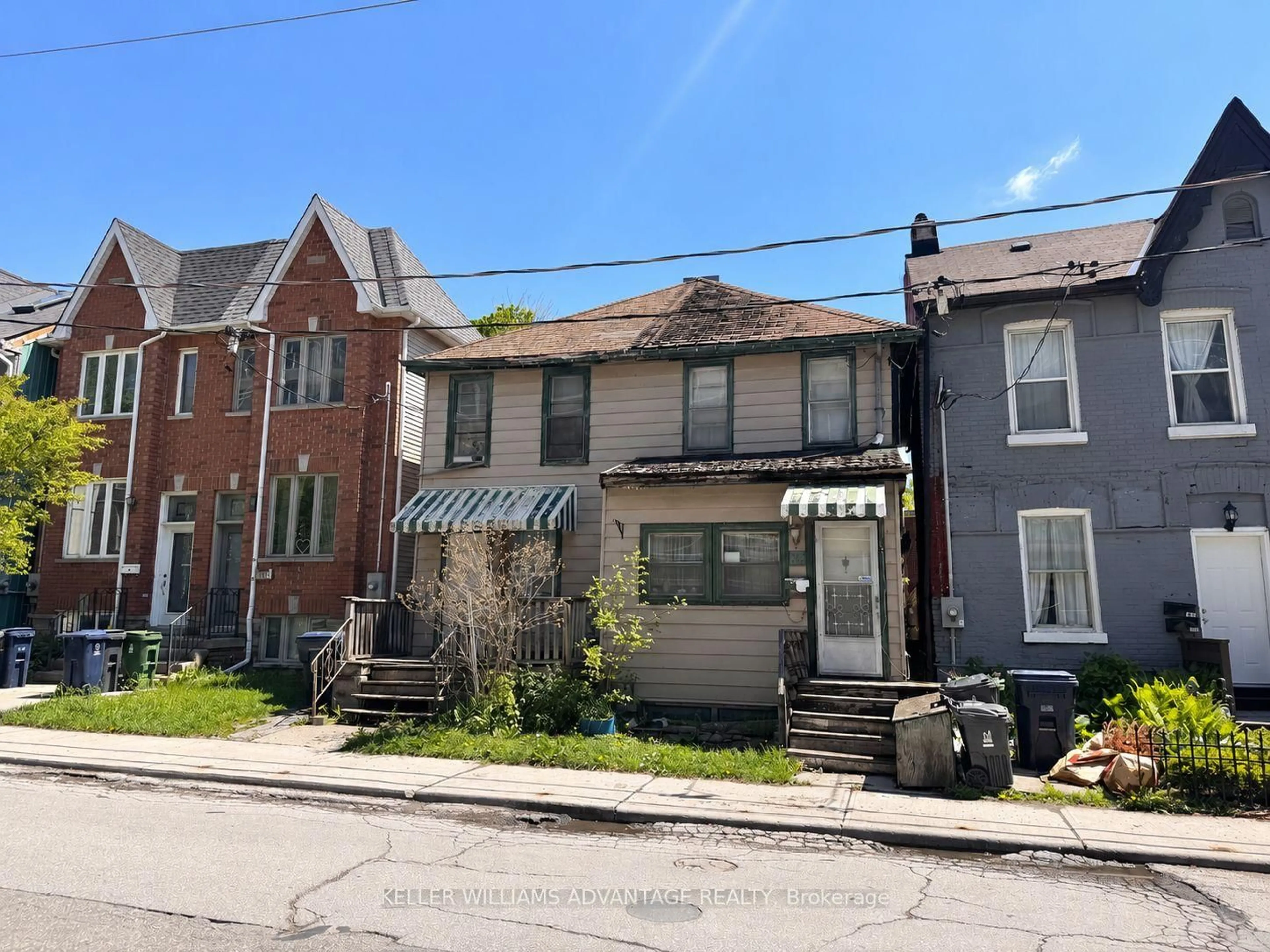 Home with brick exterior material, street for 163 Logan Ave, Toronto Ontario M4M 2N2