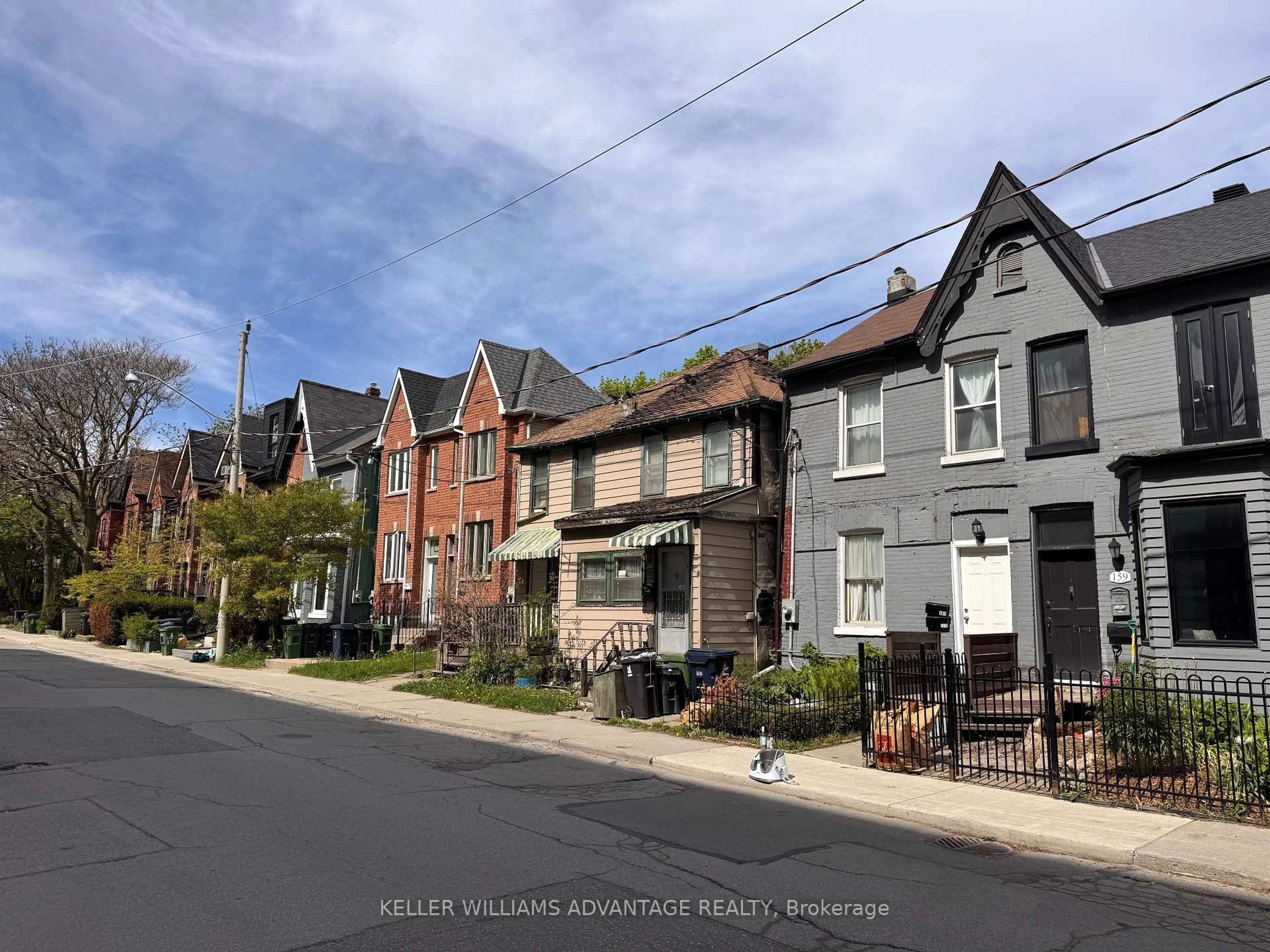 Home with brick exterior material, street for 163 Logan Ave, Toronto Ontario M4M 2N2