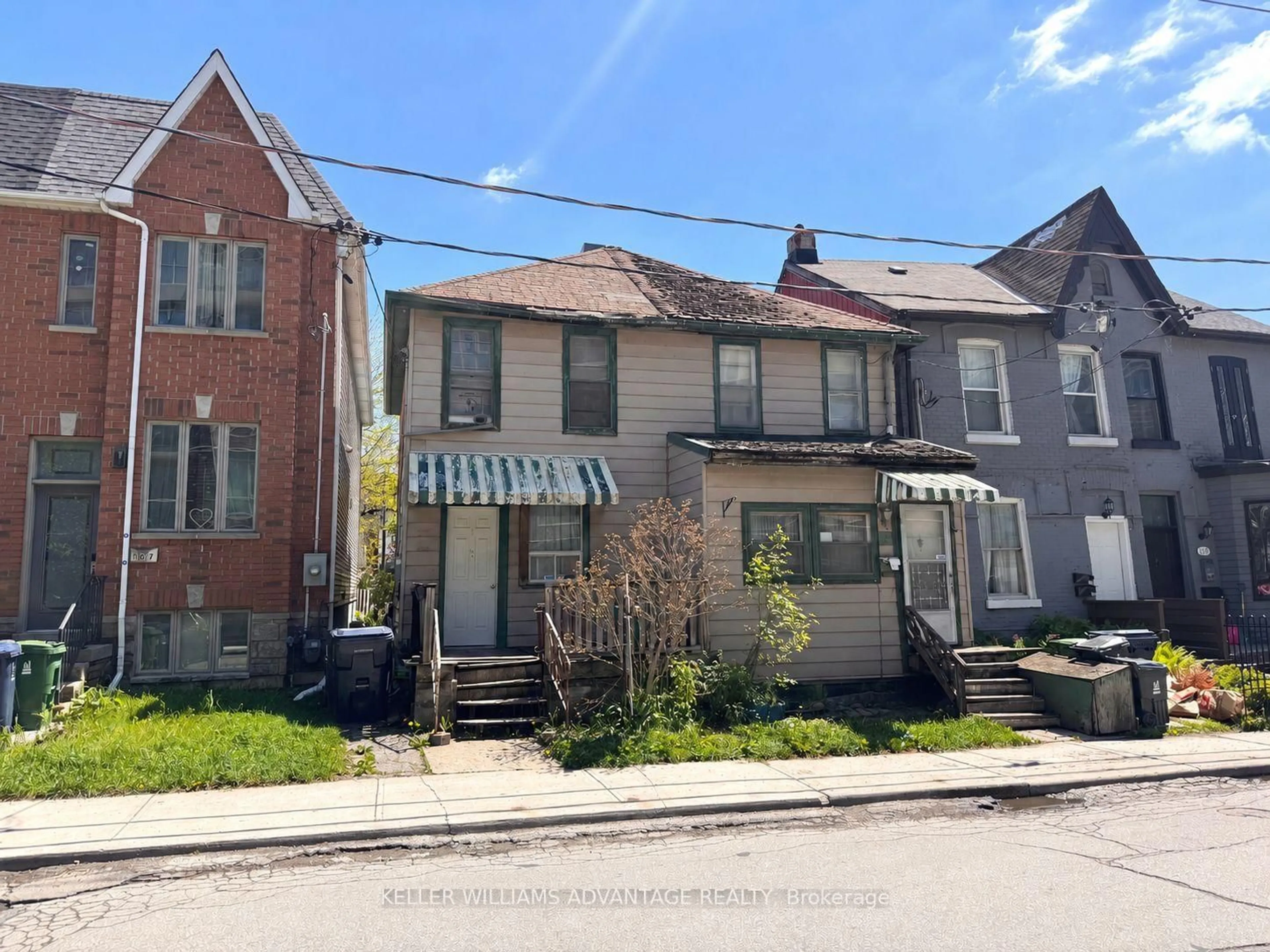 A pic from outside/outdoor area/front of a property/back of a property/a pic from drone, street for 165 Logan Ave, Toronto Ontario M4M 2N2