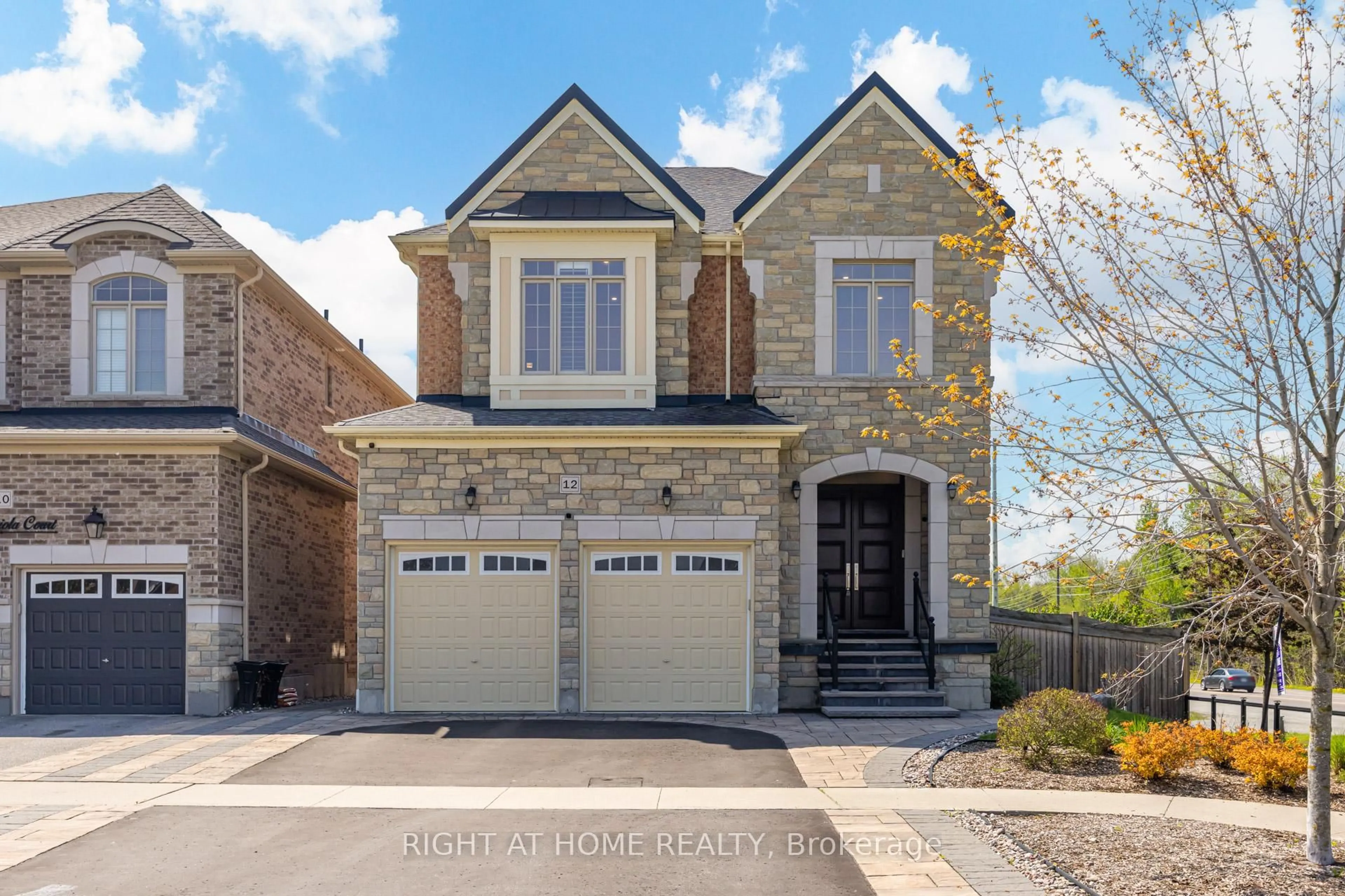 Home with brick exterior material, street for 12 Labriola Crt, Whitby Ontario L1R 0N1