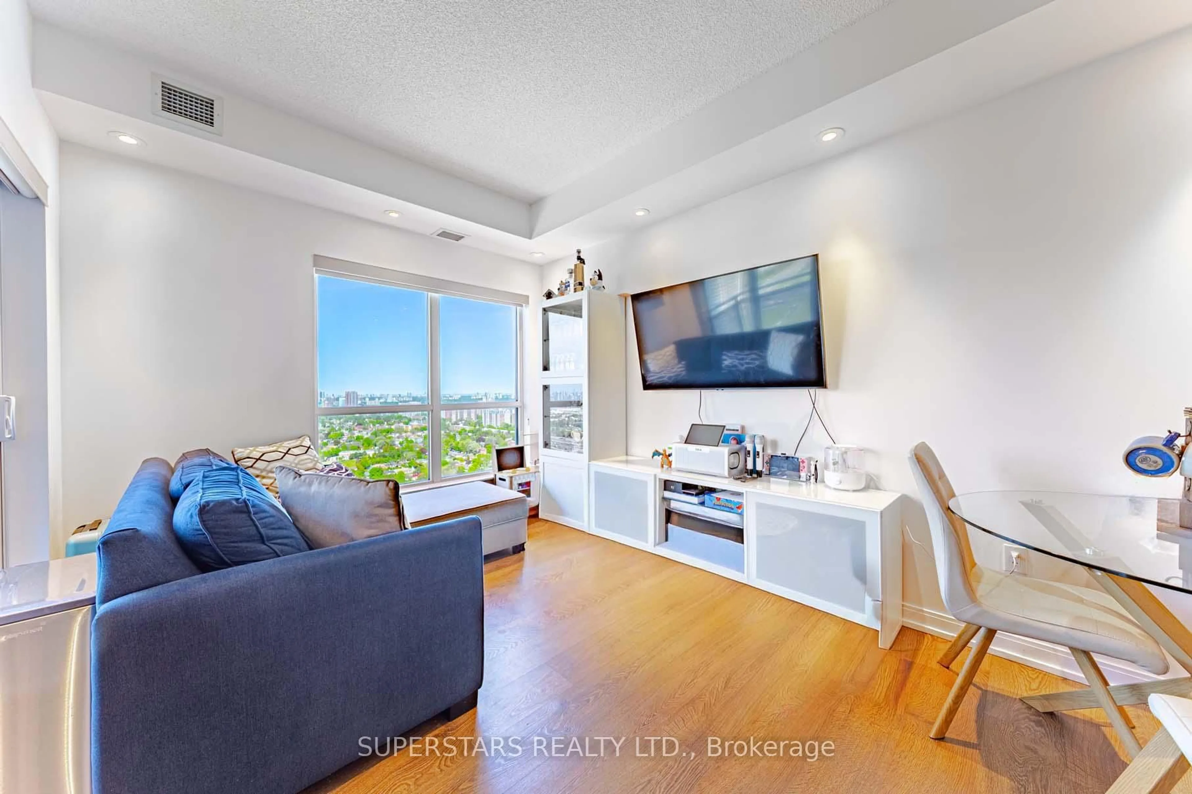 Living room with furniture, wood/laminate floor for 275 Village Green Sq #3422, Toronto Ontario M1S 0L8
