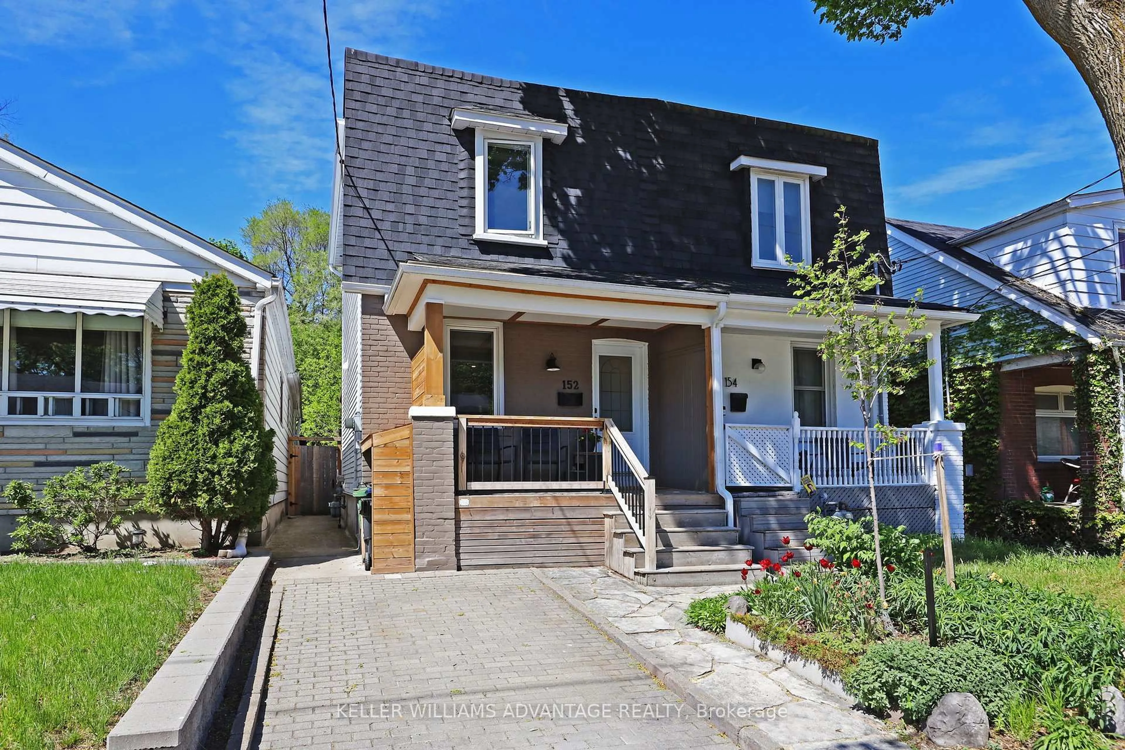 Home with brick exterior material, street for 152 King Edward Ave, Toronto Ontario M4C 5J8