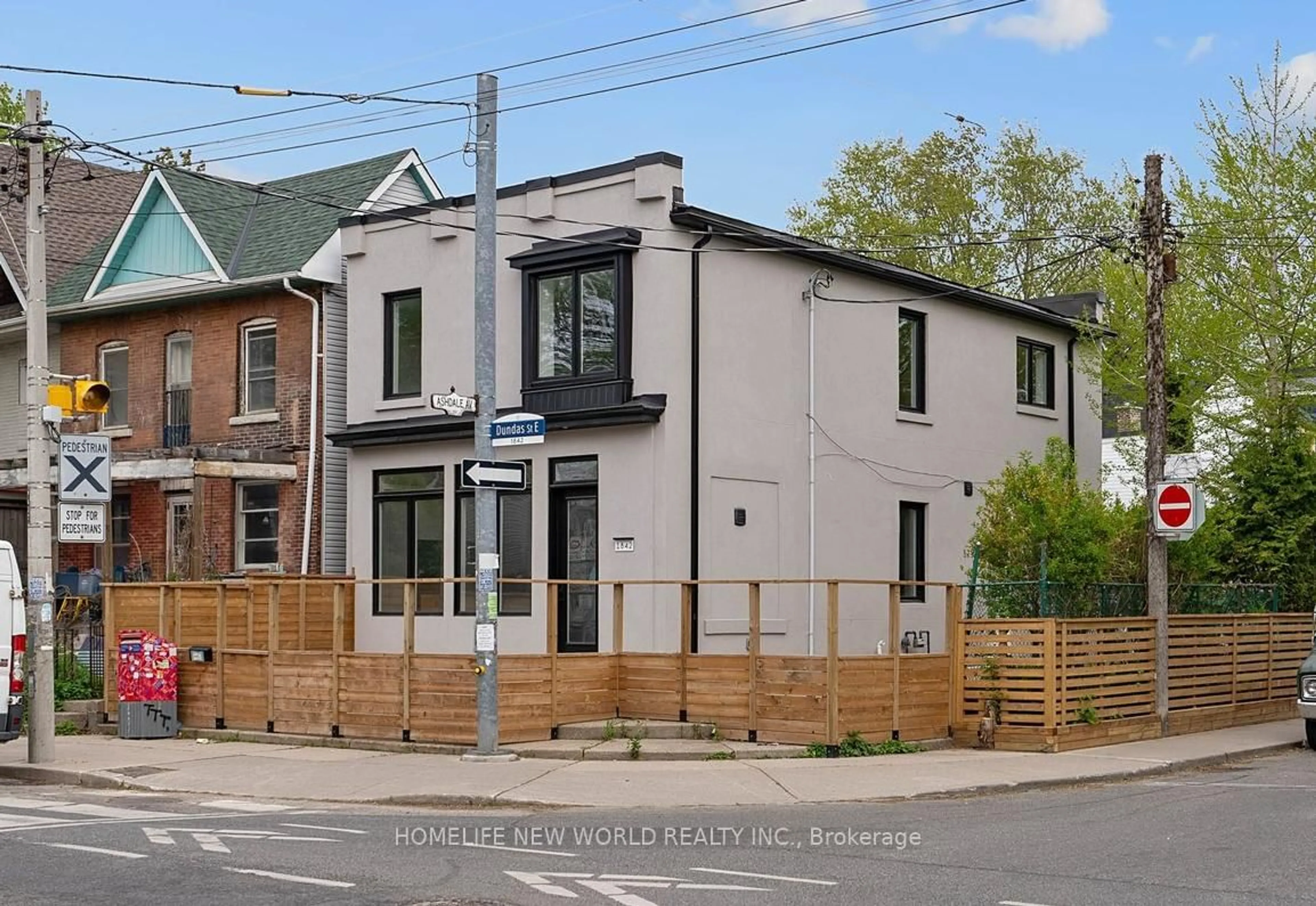 Home with brick exterior material, street for 1842 Dundas St, Toronto Ontario M4L 1M5