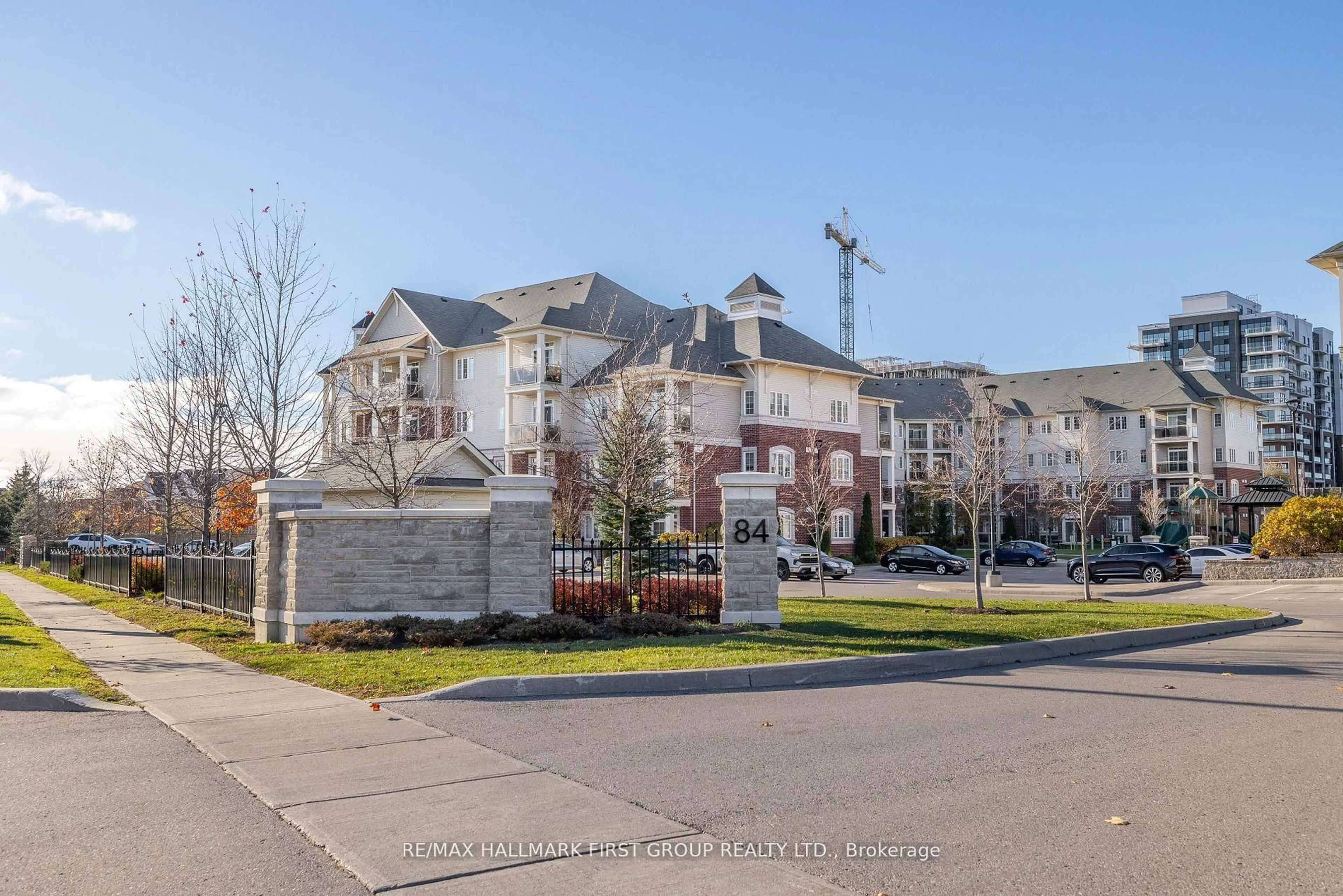 A pic from outside/outdoor area/front of a property/back of a property/a pic from drone, street for 84 Aspen Springs Dr #201, Clarington Ontario L1C 0V3
