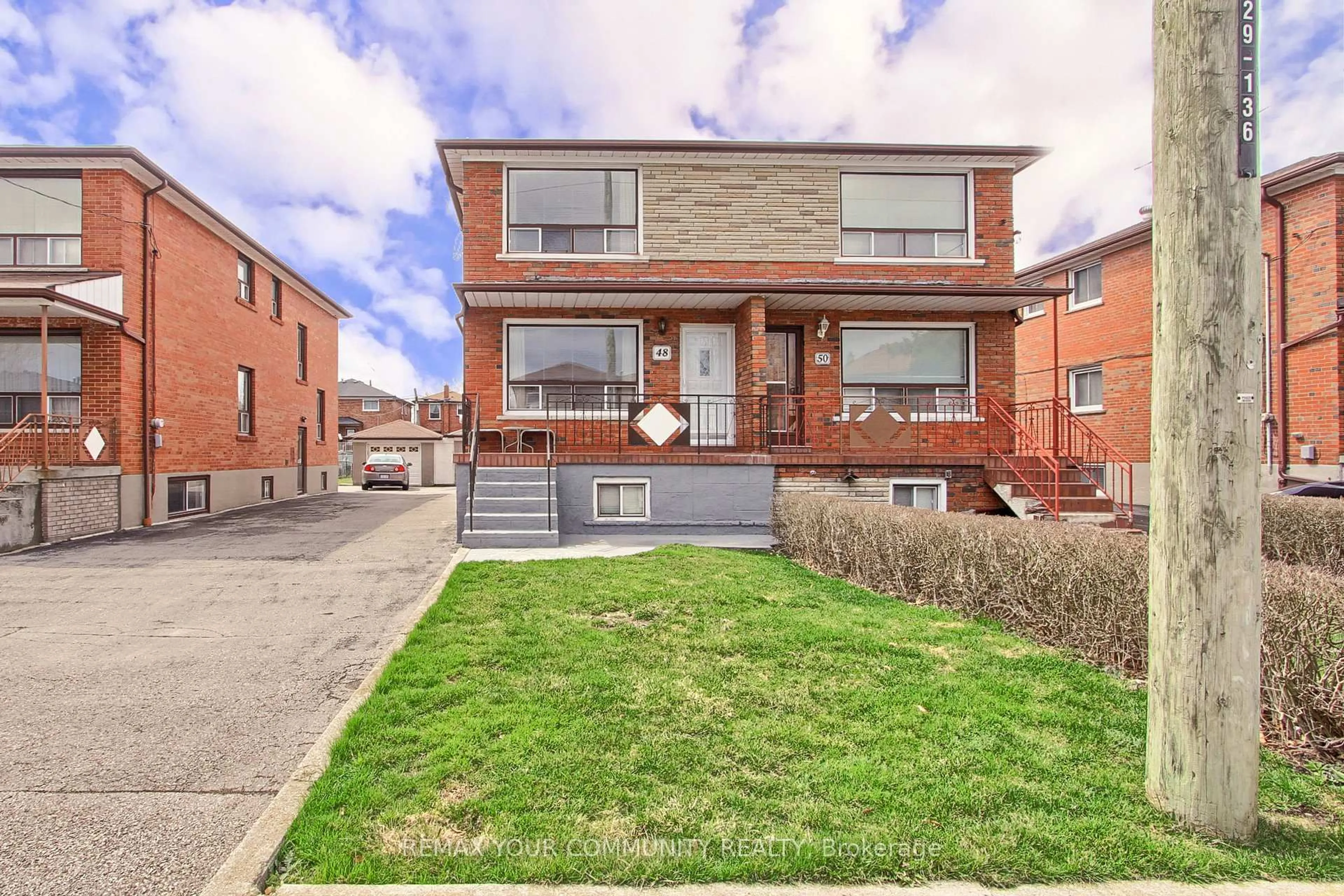 Home with brick exterior material, street for 48 North Woodrow Blvd, Toronto Ontario M1K 1W3