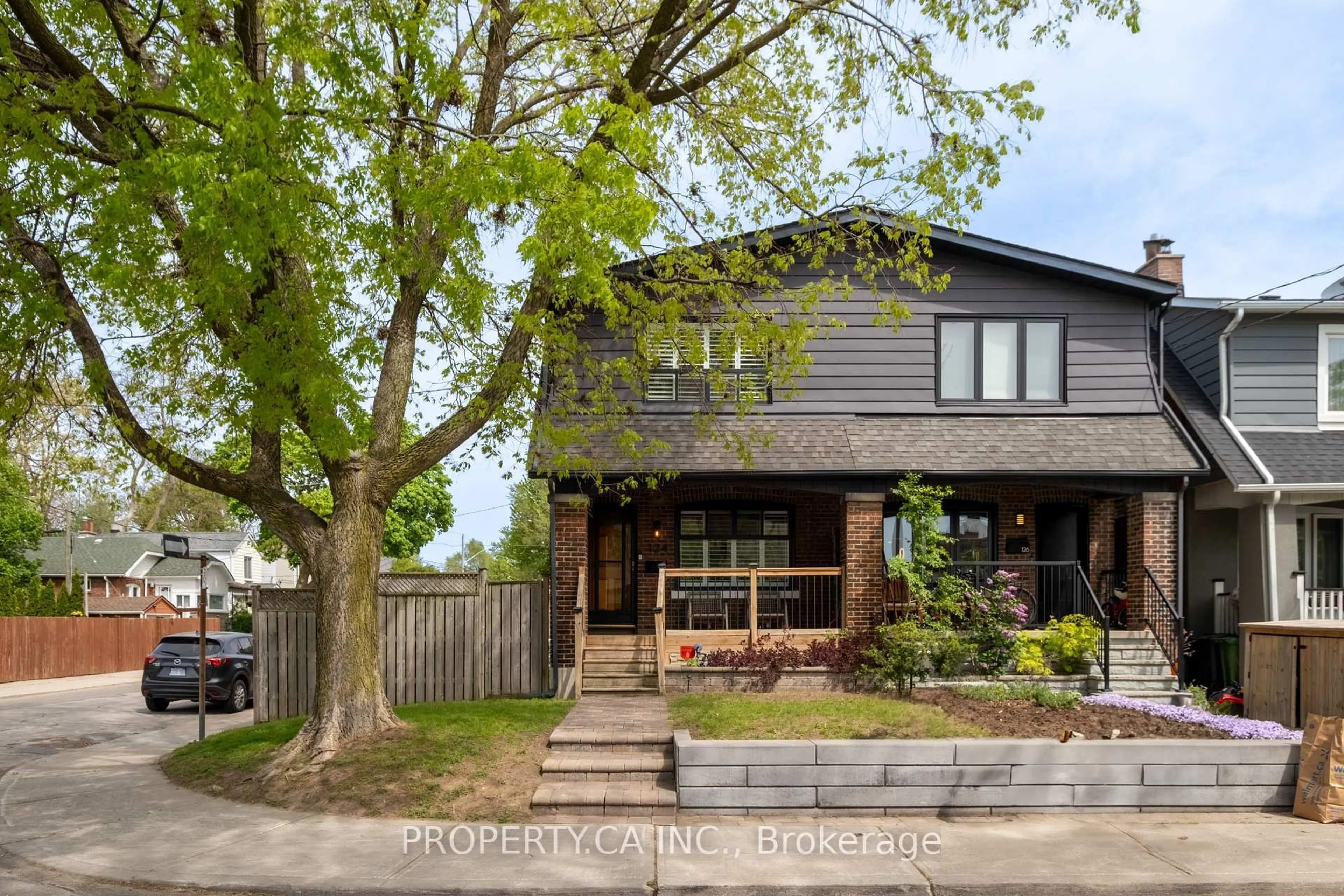 Home with brick exterior material, street for 124 Milverton Blvd, Toronto Ontario M4J 1V1