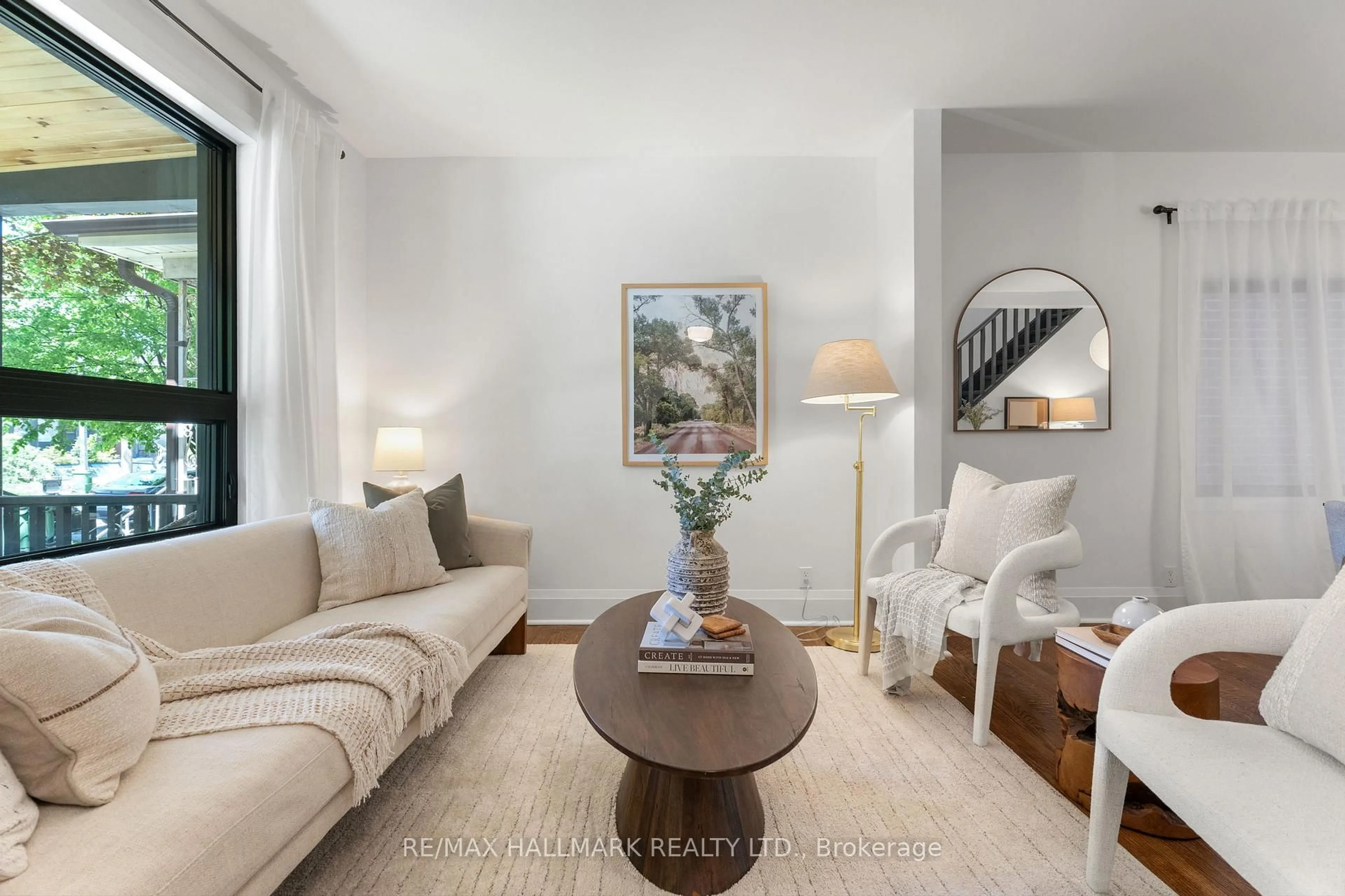 Living room with furniture, unknown for 203 Parkmount Rd, Toronto Ontario M4J 4V5
