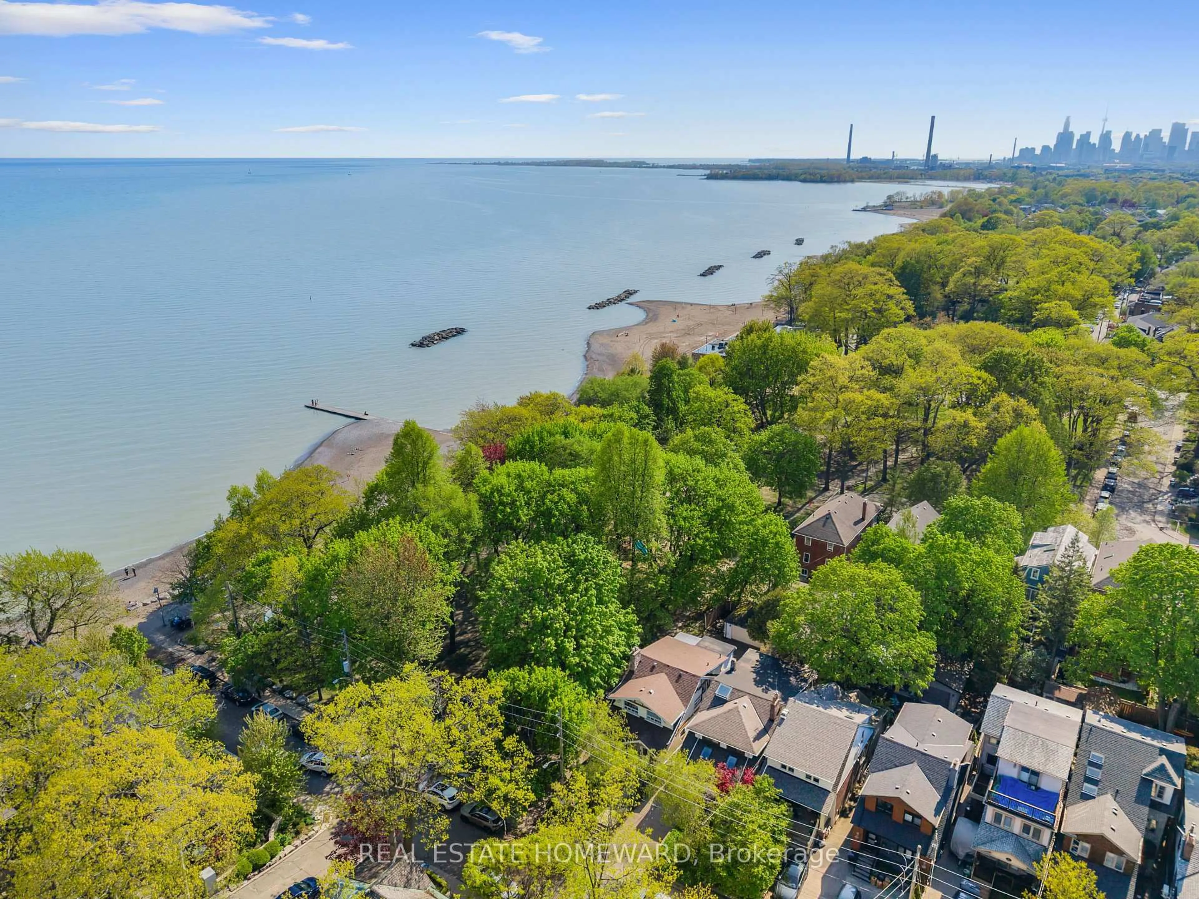 A pic from outside/outdoor area/front of a property/back of a property/a pic from drone, water/lake/river/ocean view for 4 Silver Birch Ave, Toronto Ontario M4E 3K9