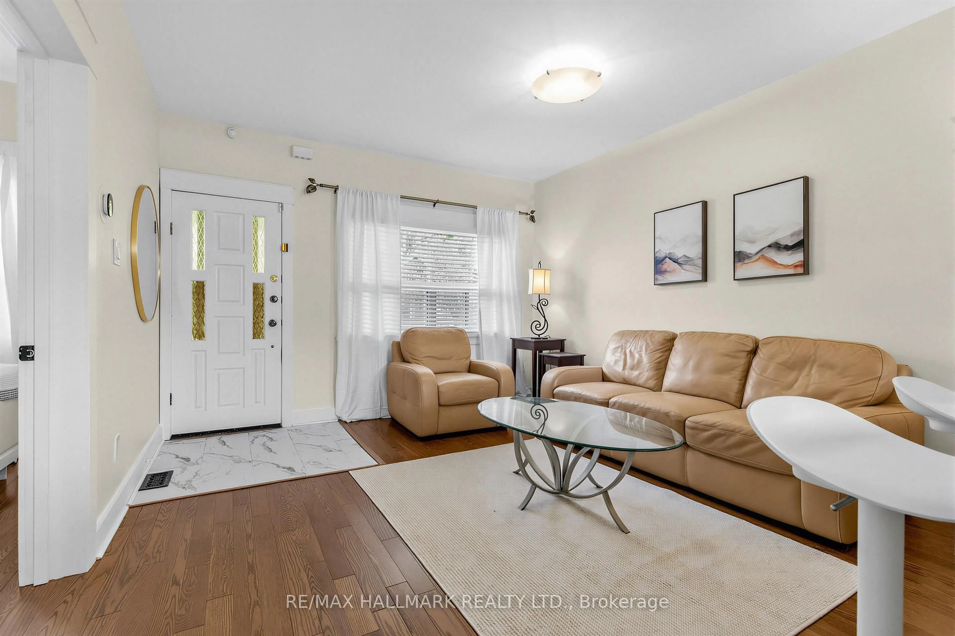 Living room with furniture, unknown for 65 Wallington Ave, Toronto Ontario M4C 2N2