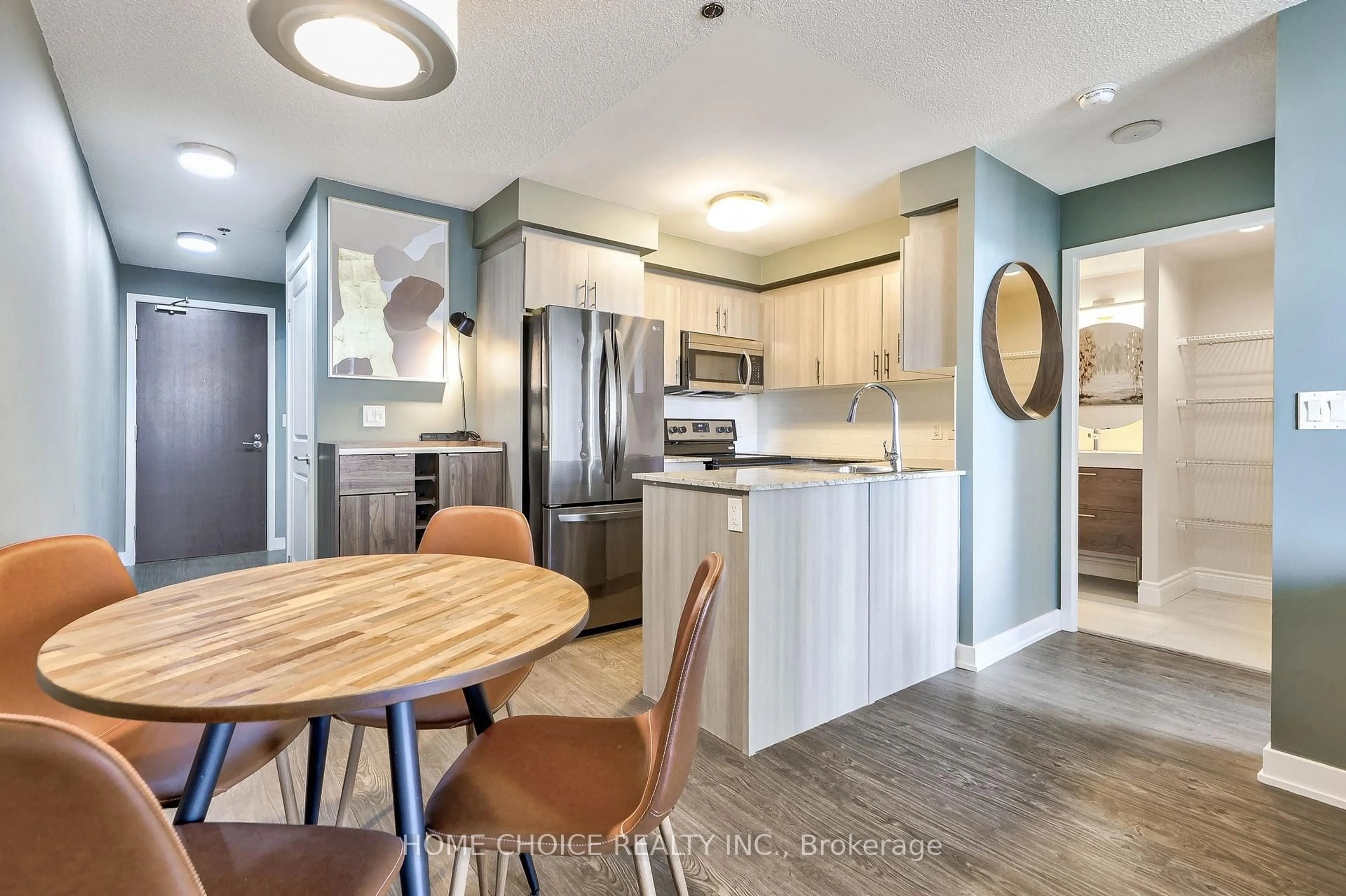 Open concept kitchen, wood/laminate floor for 185 Bonis Ave #1101, Toronto Ontario M1T 0A4