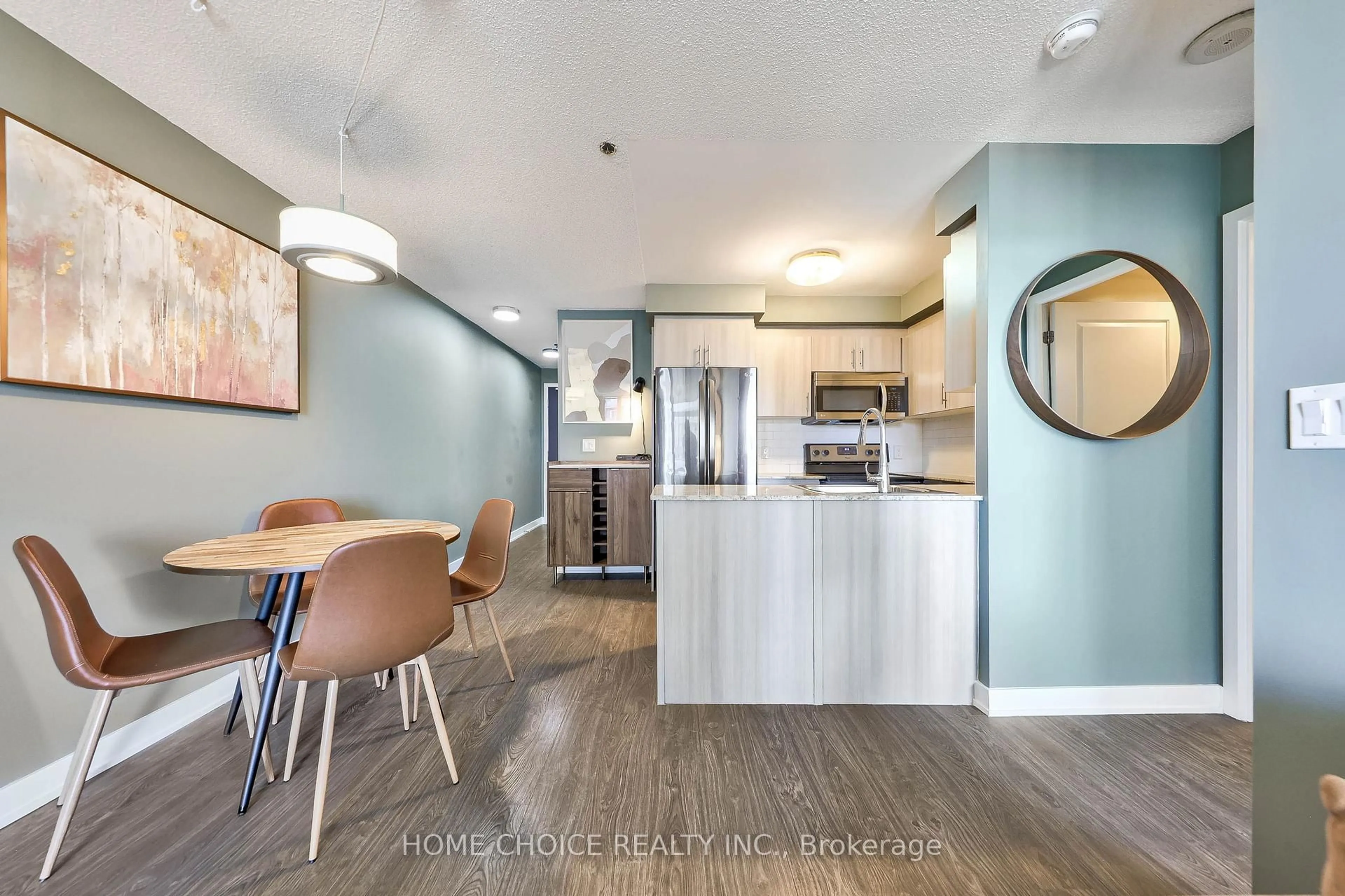 Open concept kitchen, wood/laminate floor for 185 Bonis Ave #1101, Toronto Ontario M1T 0A4