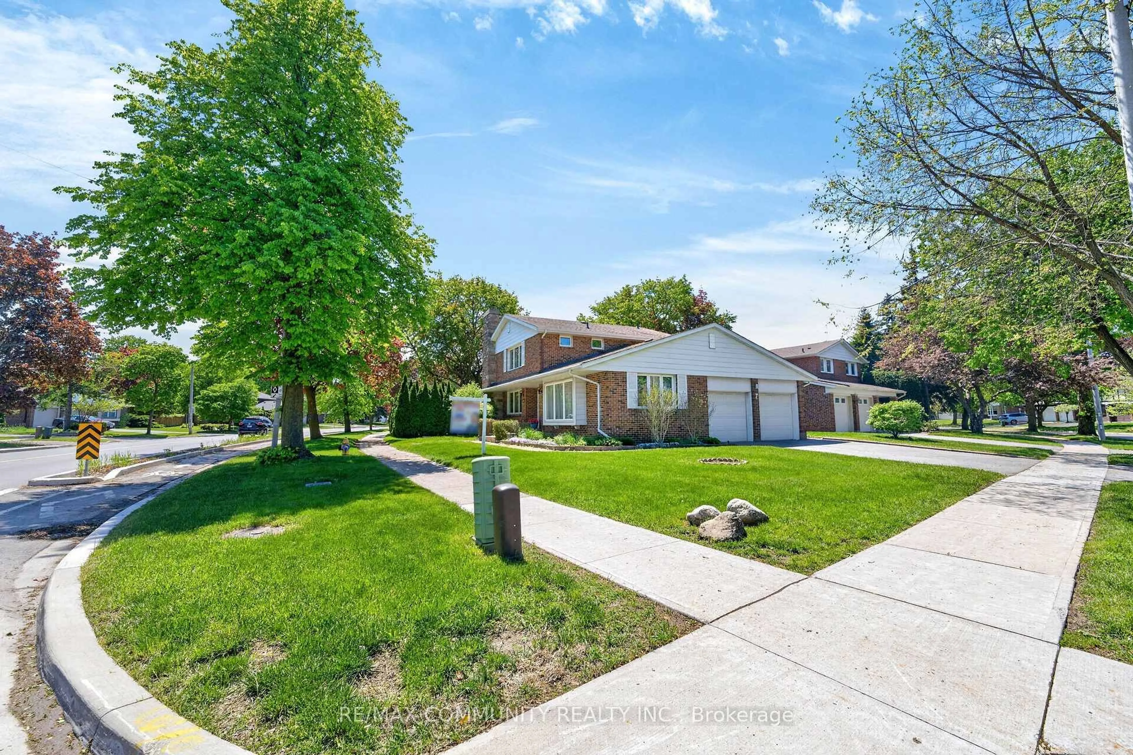 A pic from outside/outdoor area/front of a property/back of a property/a pic from drone, street for 588 Huntingwood Dr, Toronto Ontario M1W 1G8
