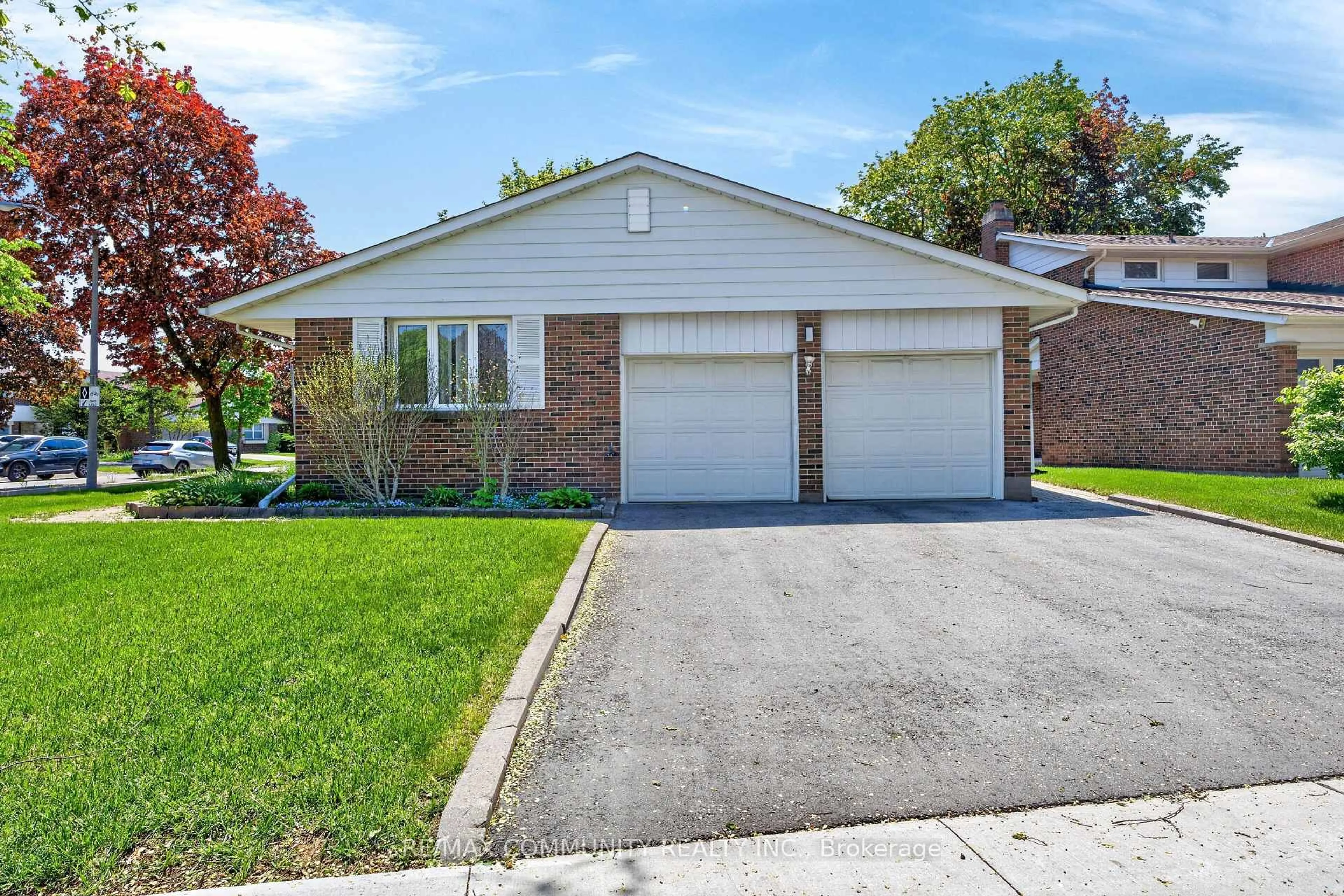 Home with brick exterior material, street for 588 Huntingwood Dr, Toronto Ontario M1W 1G8