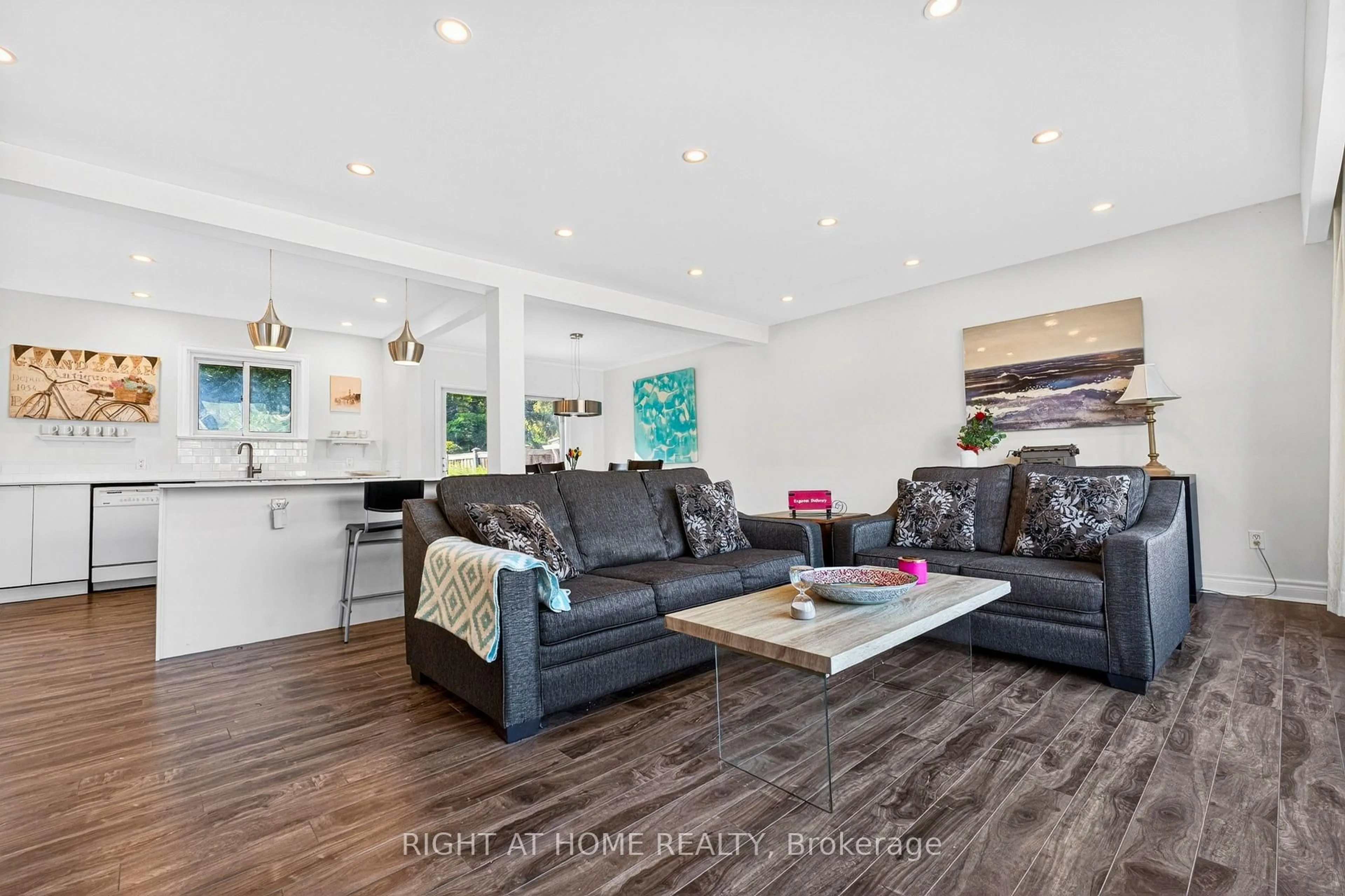 Living room with furniture, wood/laminate floor for 78 Sylvan Ave, Toronto Ontario M1M 1K1