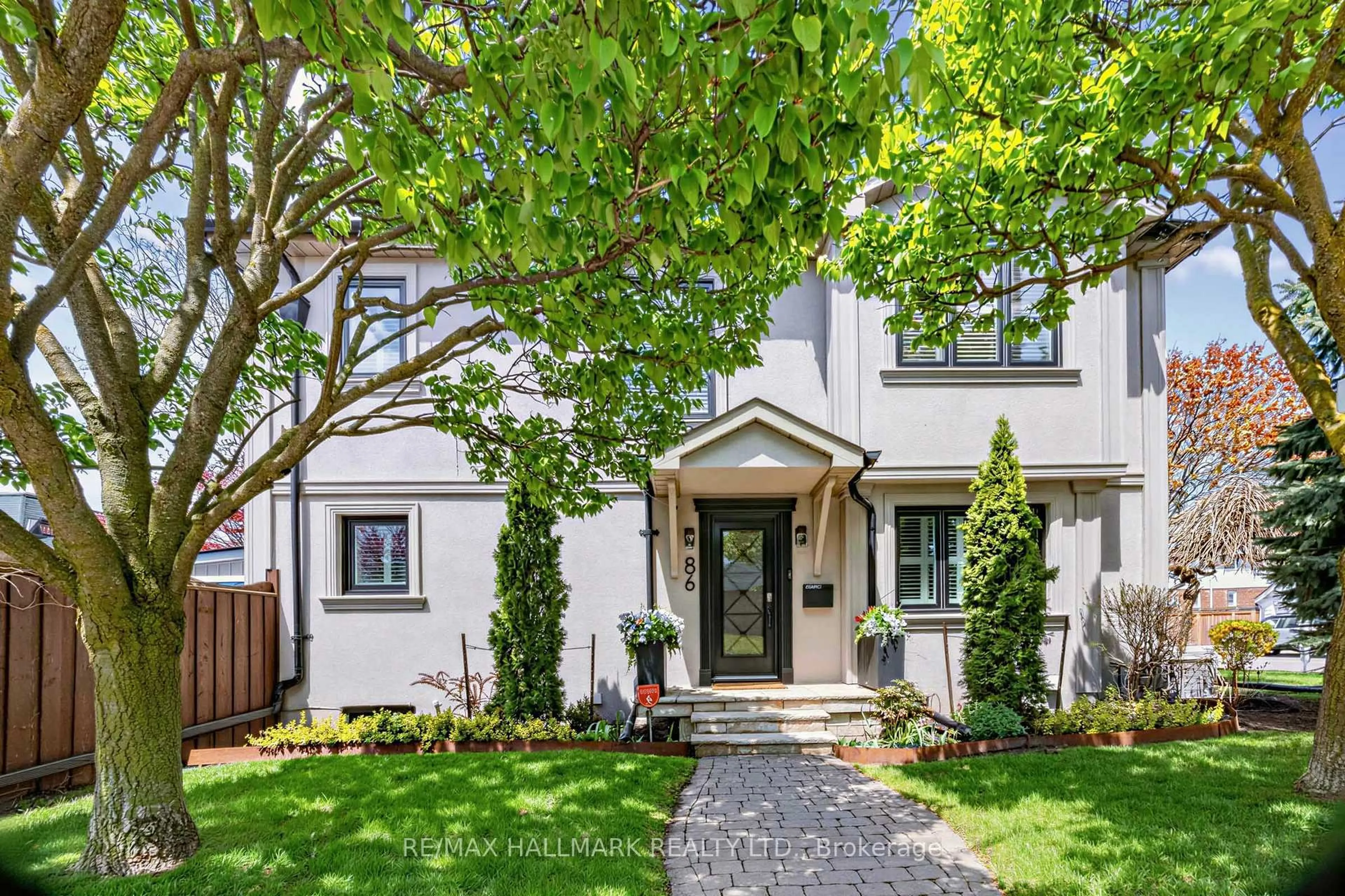 Home with brick exterior material, street for 86 Binswood Ave, Toronto Ontario M4C 3N9
