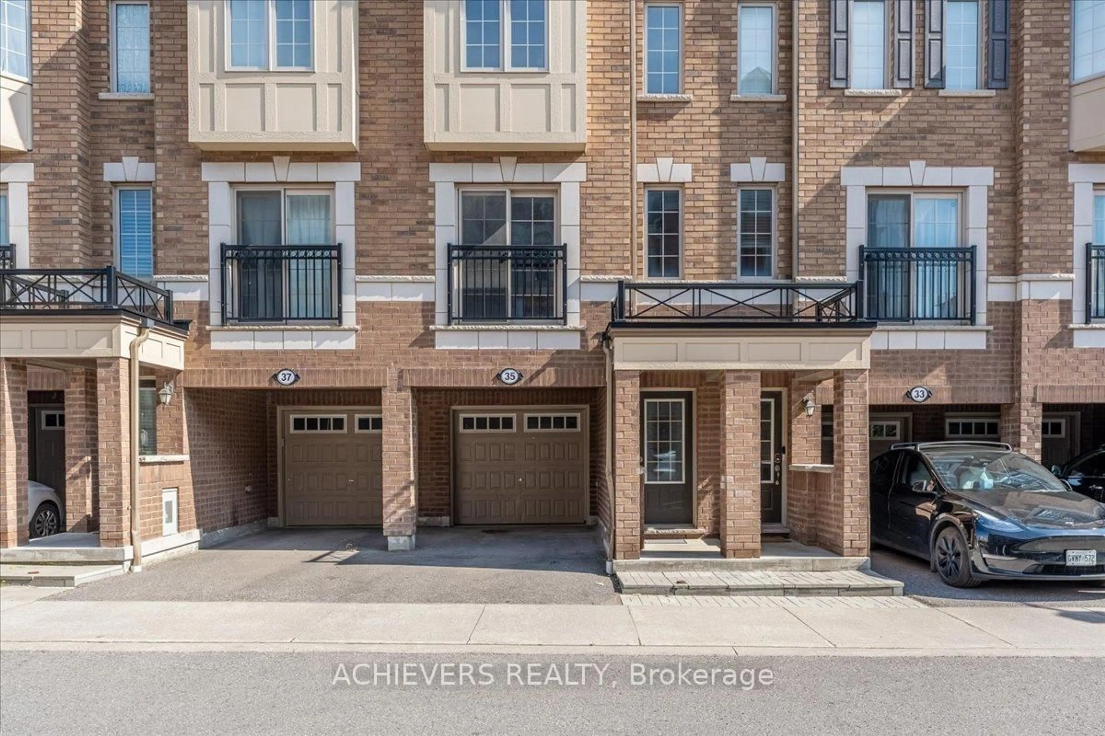 Home with brick exterior material, street for 35 Glenstal Path, Oshawa Ontario L1L 0L2